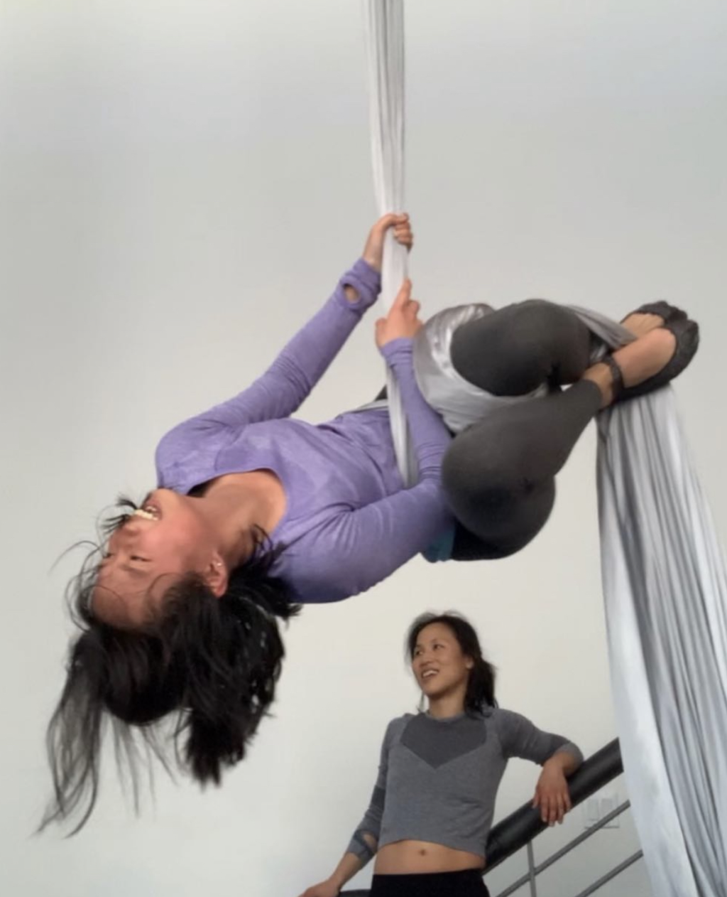 Thoroughly enjoying hanging upside down at an aerial silks class. 🤸
