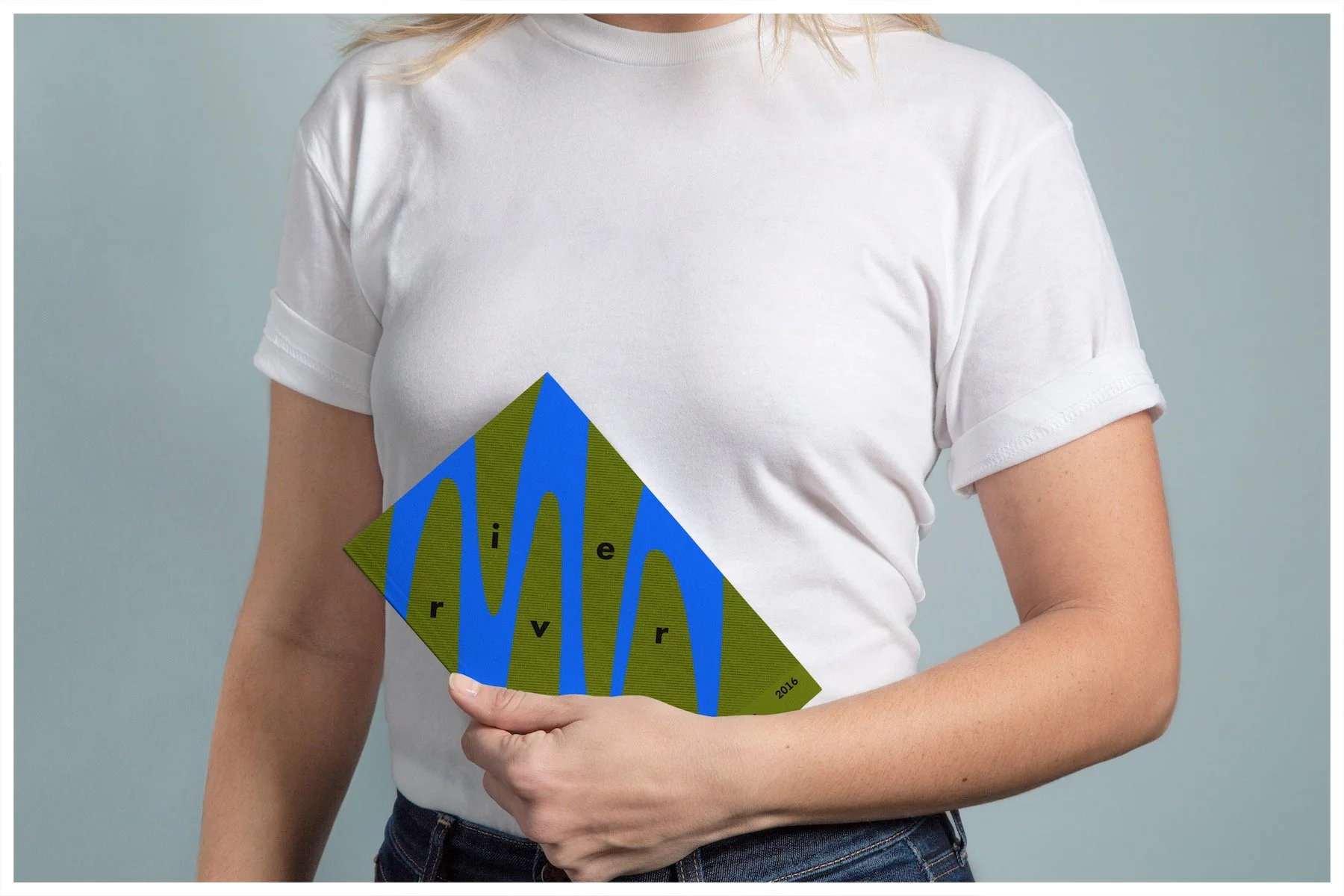 A book mockup using a design showcasing the fictitious business of River Wines with a minimalism approach. Poster design by Carmelo Rossette.