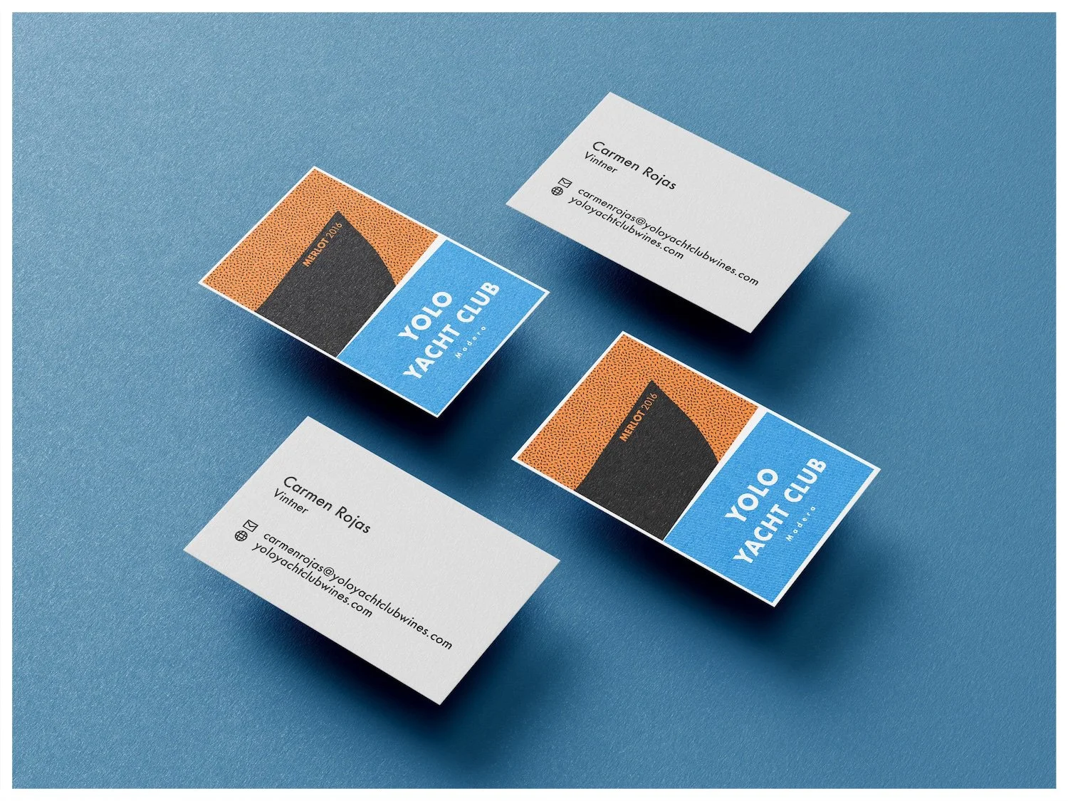 Business card mockup using a design showcasing the fictitious company Yolo Yacht Club Wines with a minimalism approach. Poster design by Carmelo Rossette.