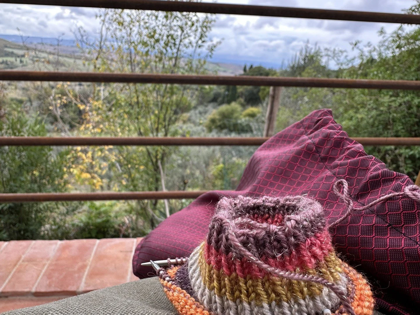 I once knit a pair of socks while chilling on a bench in Tuscany, taking in the gorgeous views 🧶🌄 It was so relaxing and fulfilling! Don't forget to take small easy to travel projects with you so you too can stop and enjoy the view while getting so
