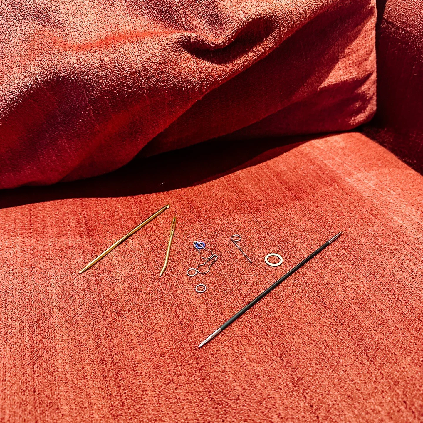 Friendly reminder to check your couch cushions today. 🛋️🧶
Mine has a habit of borrowing knitting tools &mdash; stitch markers, needles, the occasional tapestry needle &mdash; and then forgetting to give them back.
Every once in a while I go digging