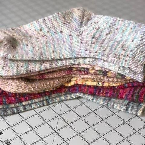 A little pile of happy feet. 🧦🌈
These are all handknit socks, stacked up after a good block and ready for real-life adventures. How many pairs do you think every knitter needs in their drawer: 3, 12, or &ldquo;there&rsquo;s no such thing as too man