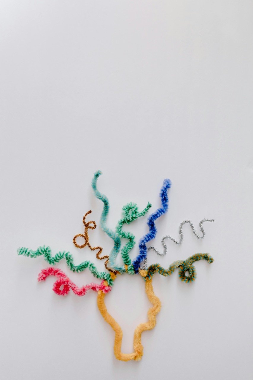 A pipe cleaner head and hair