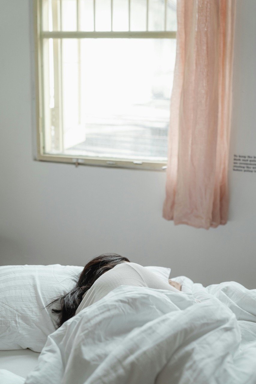 A woman sleep in bed