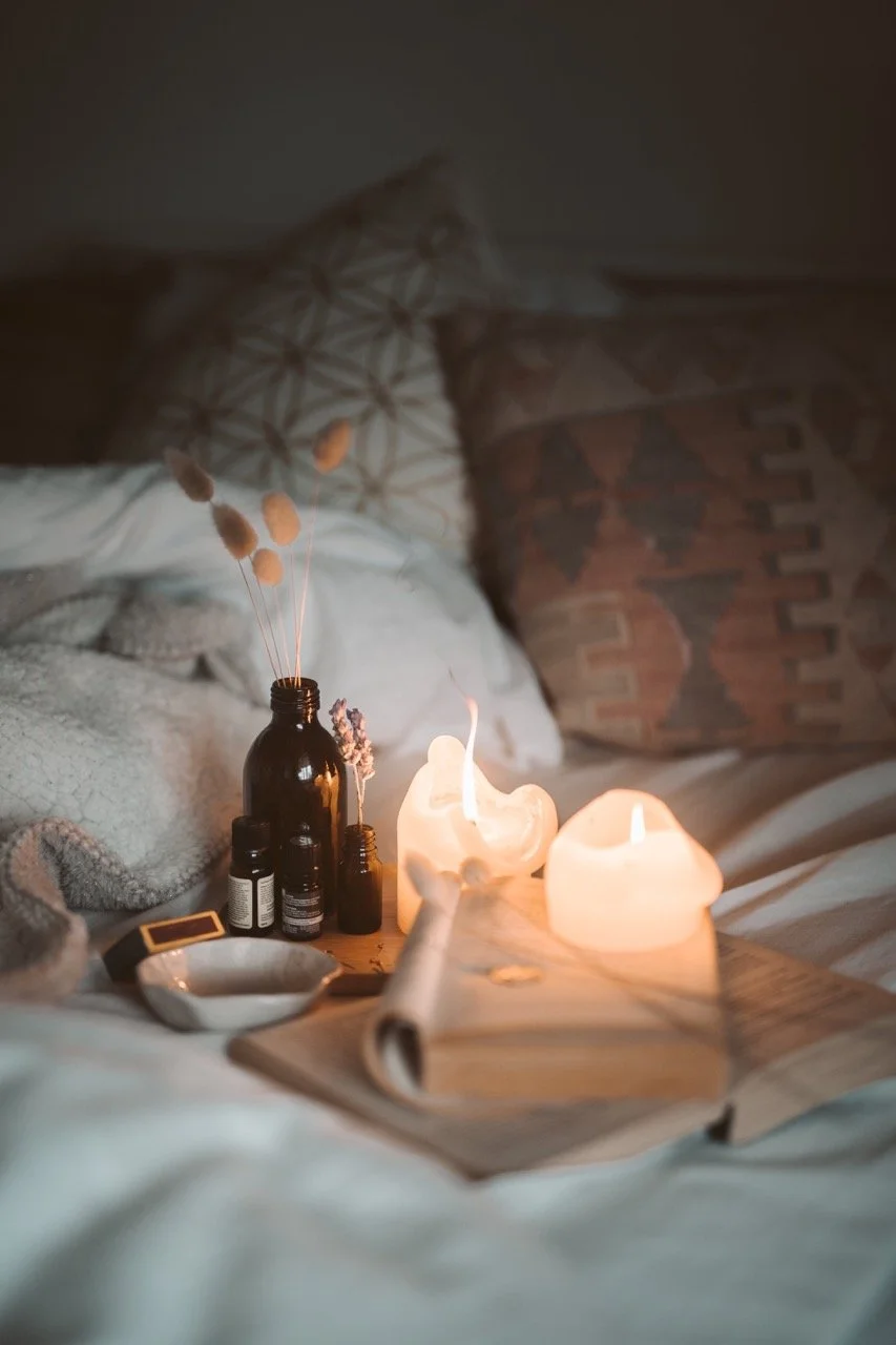 A calming bedtime: candles, oils, lavender and a book