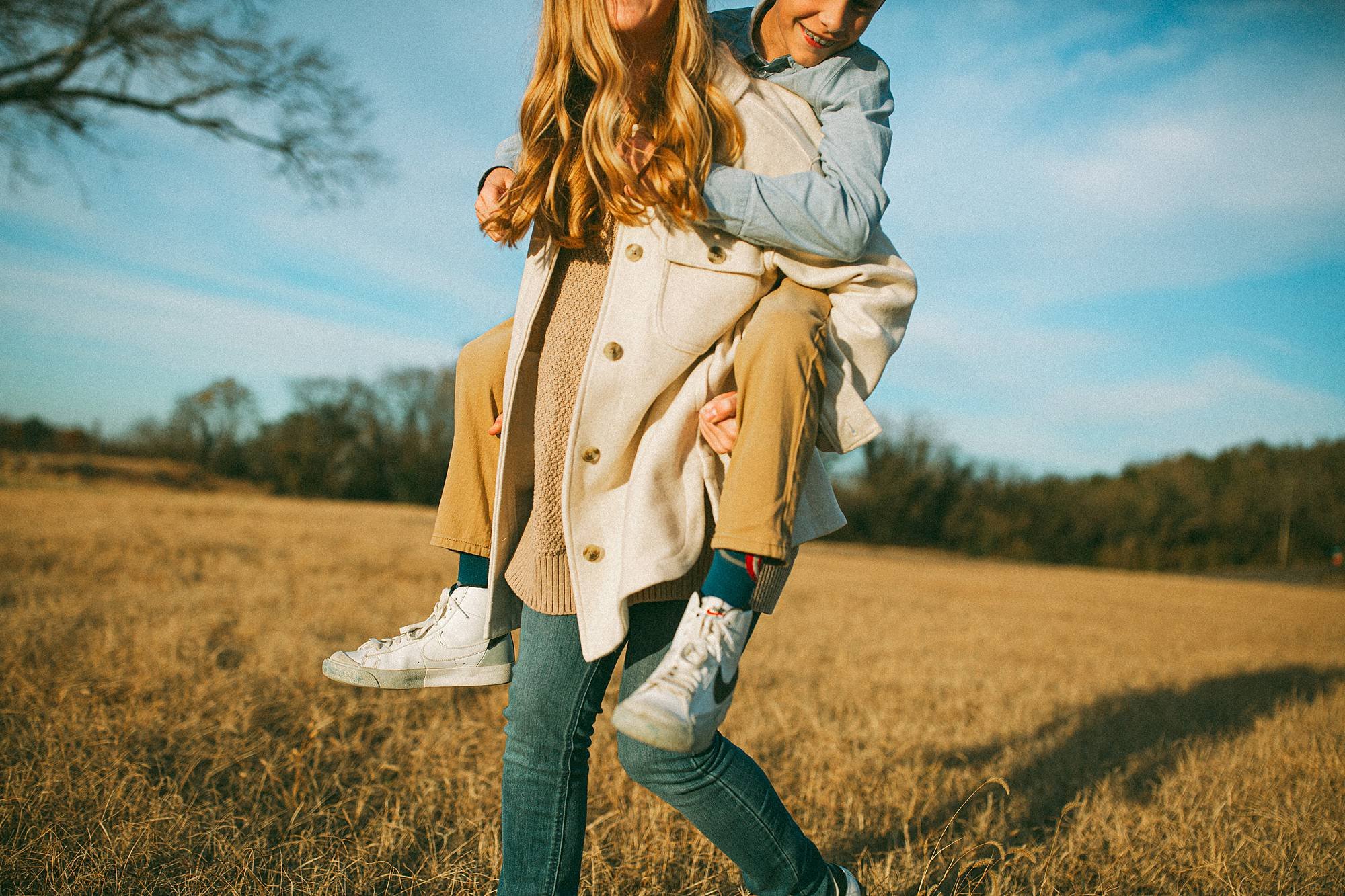 brother sister photo in field