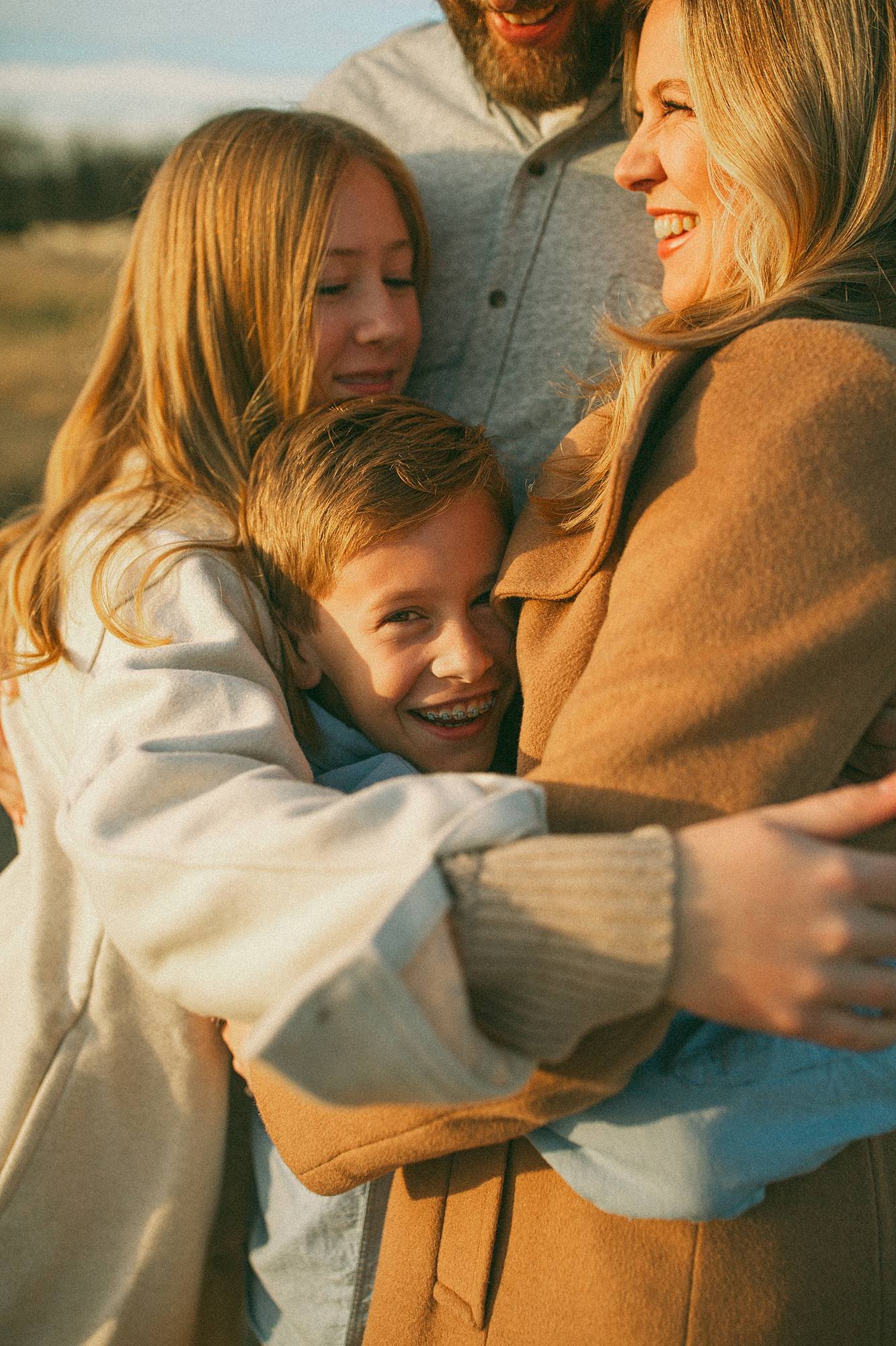 candid family photo hug
