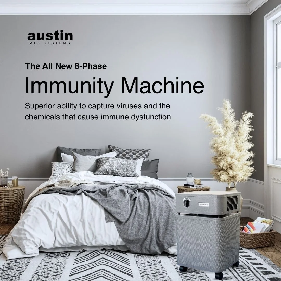 Austin Air Immunity Machine air purifier placed in a bedroom for continuous air purification