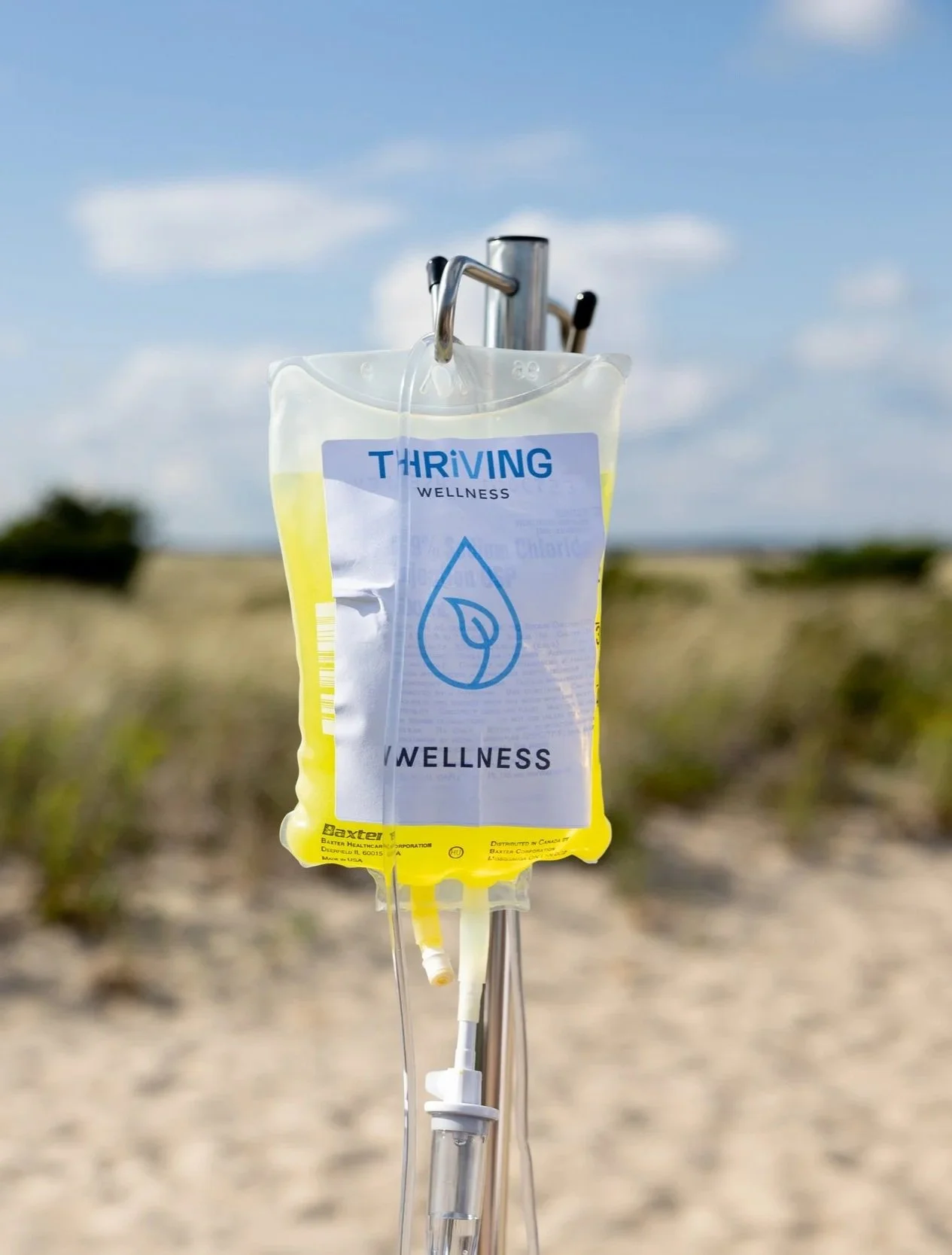 Thriving Wellness IV therapy bag on the beach for the Summer Kickoff Open House in Beach Haven, NJ