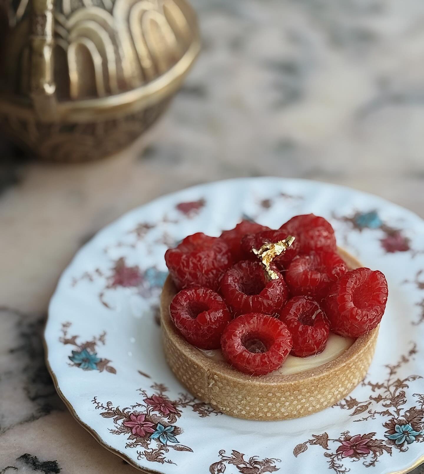 Good morning! Could we interest you in this perfect yuzu raspberry tart?