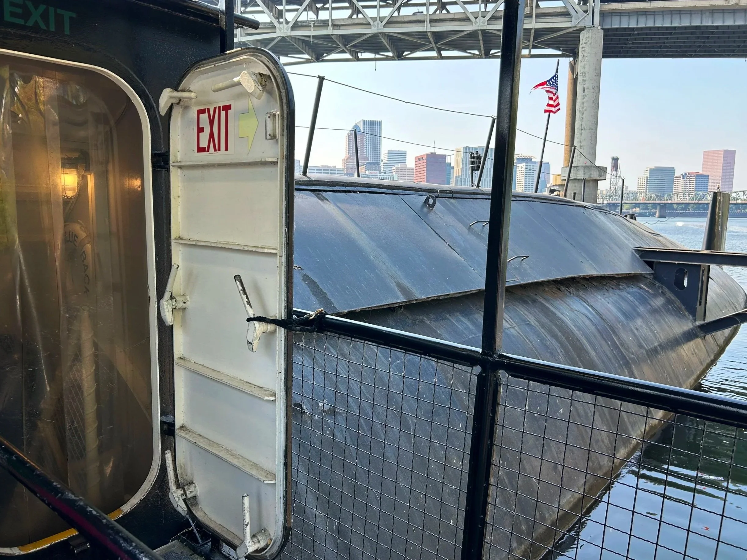 Submarine in Willamette River and Portland skyline behind