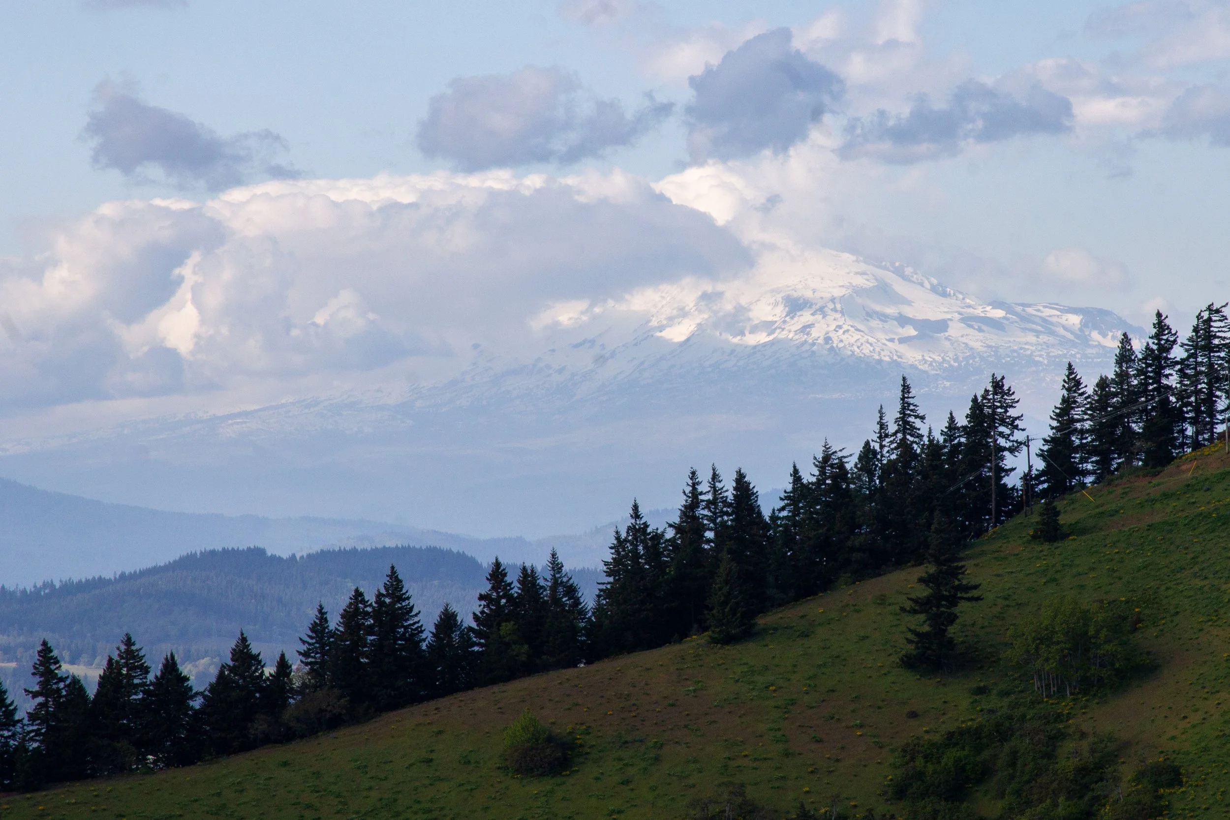 Clouds partially cover Mount Adams