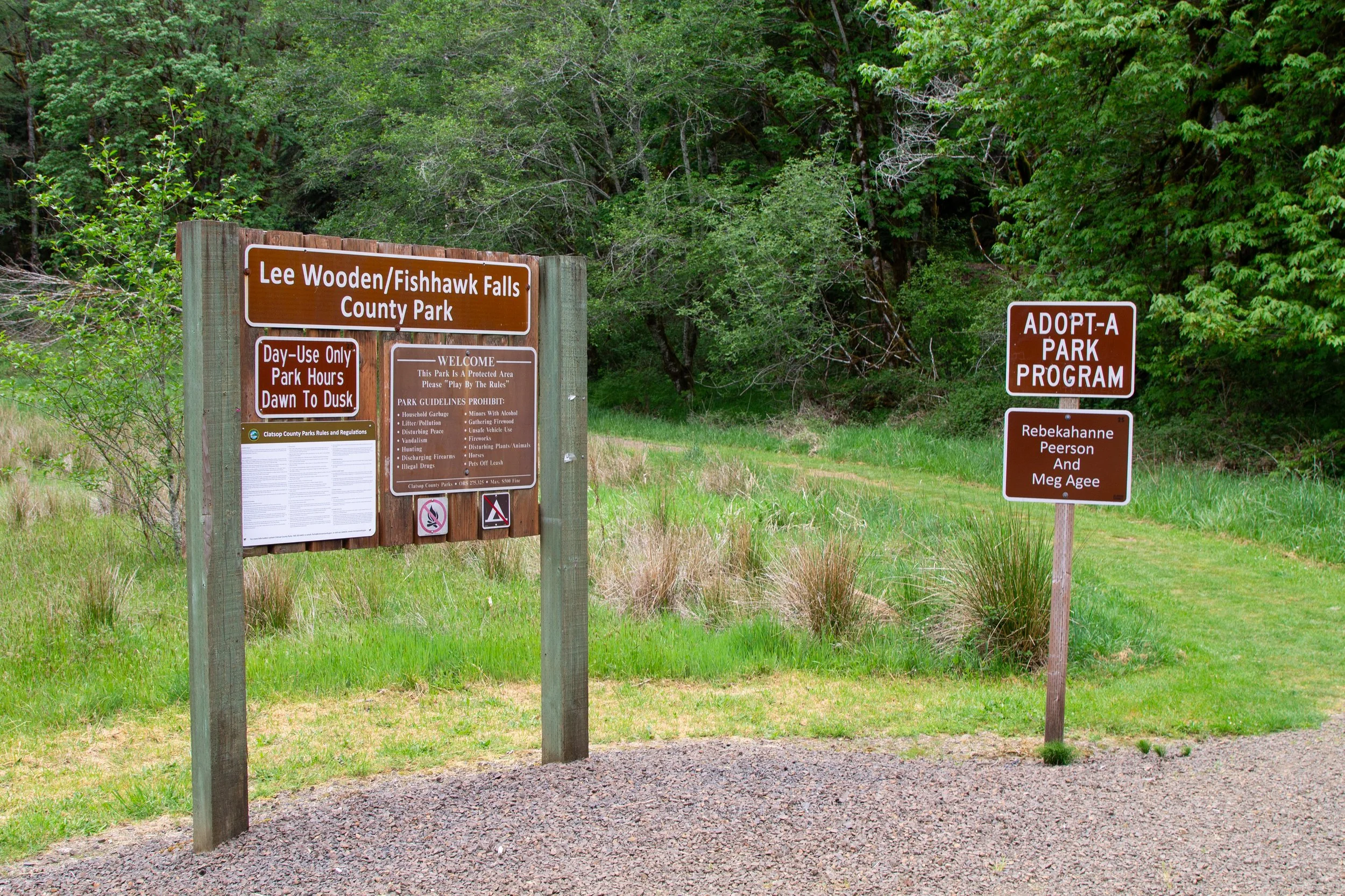 Signs in Lee Wooden Fishhawk Falls County Park parking lot