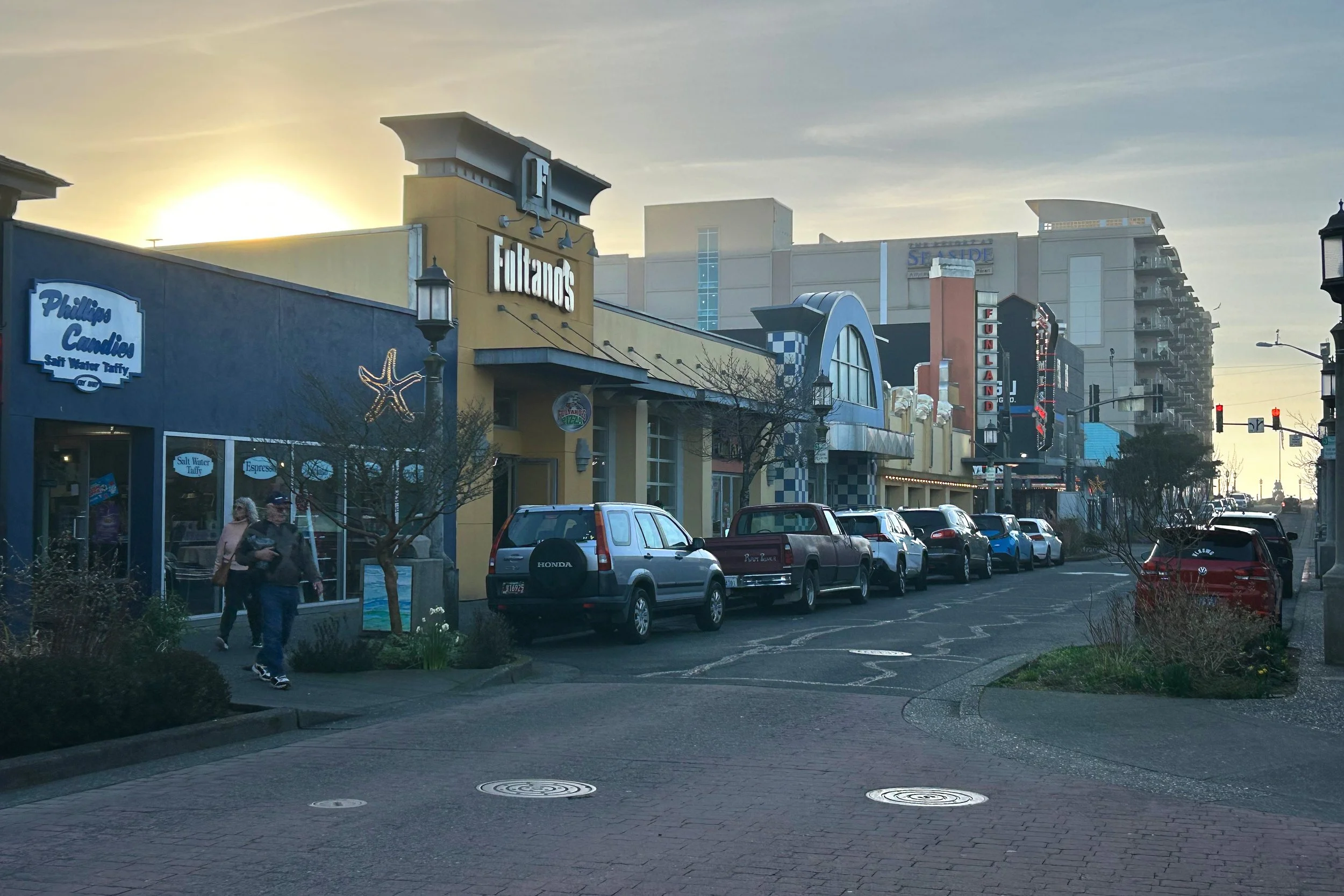 Storefronts on Broadway Street at sunset