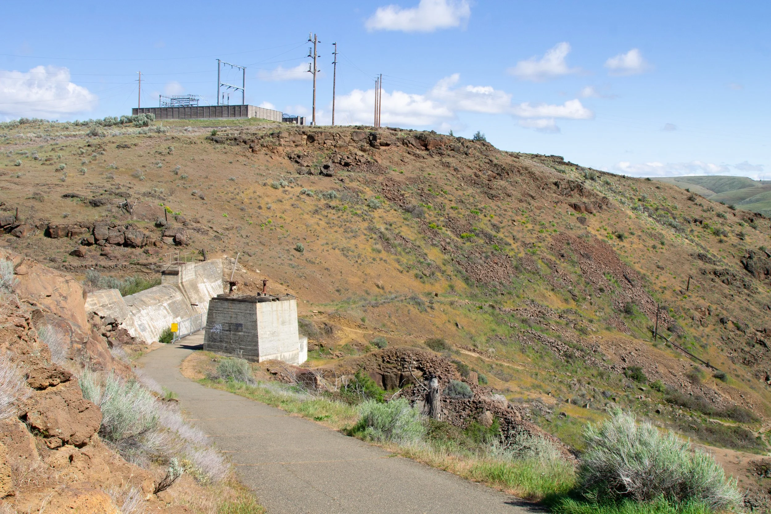 Paved trail on high desert hill