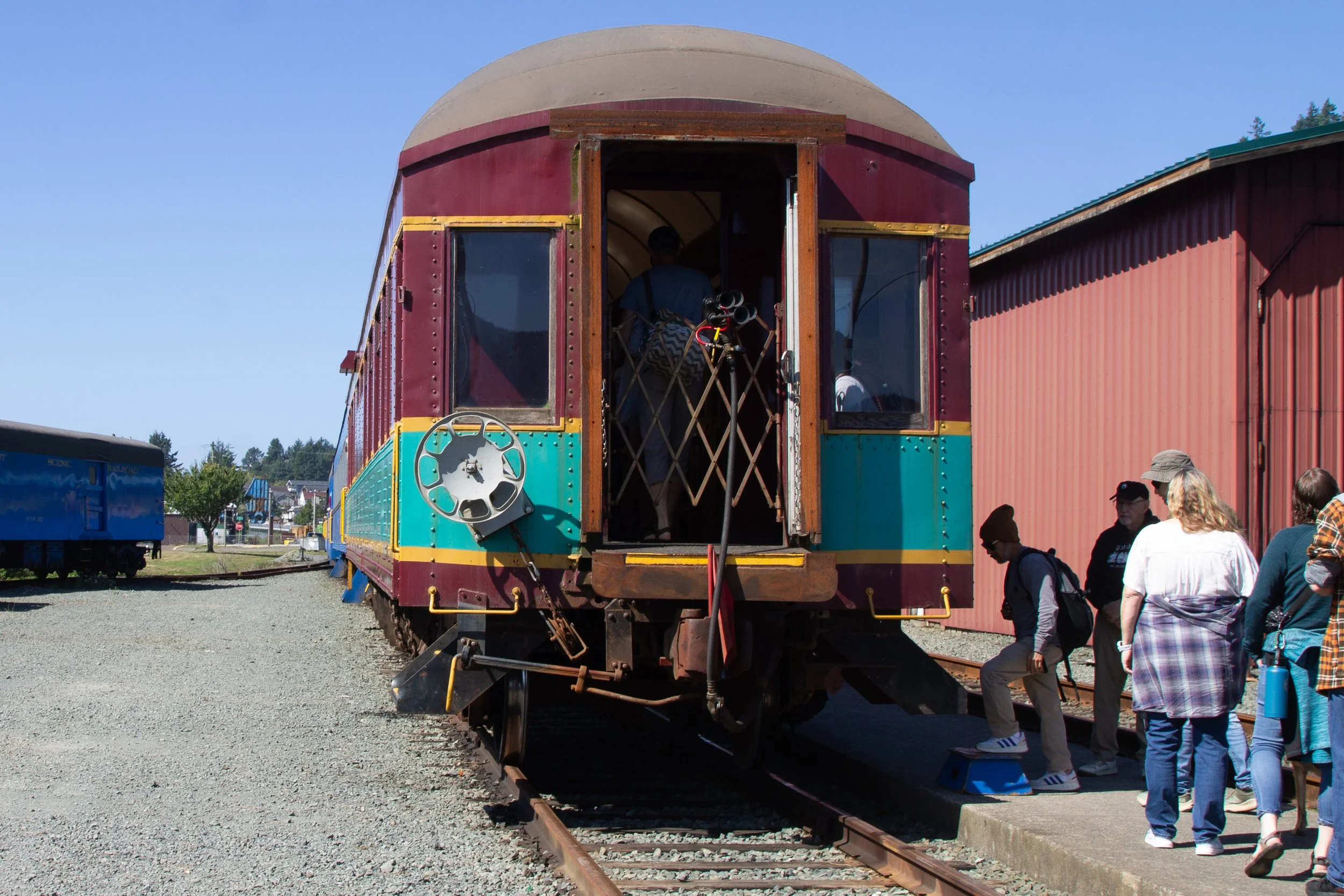 Line of people boarding the Oregon Coast train