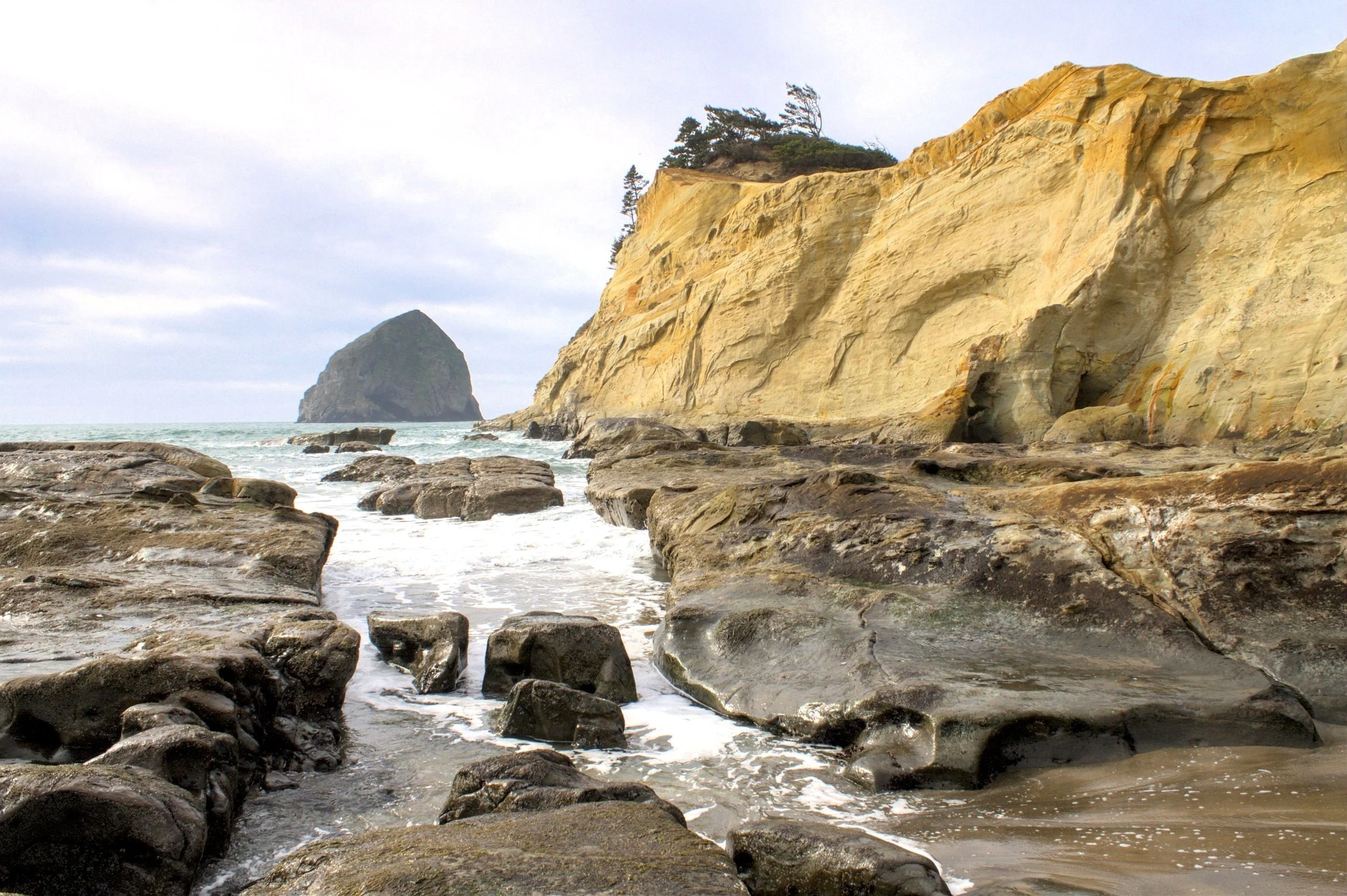 Cape Kiwanda and Its Big Sinkhole — Pines and Vines — Pines and Vines