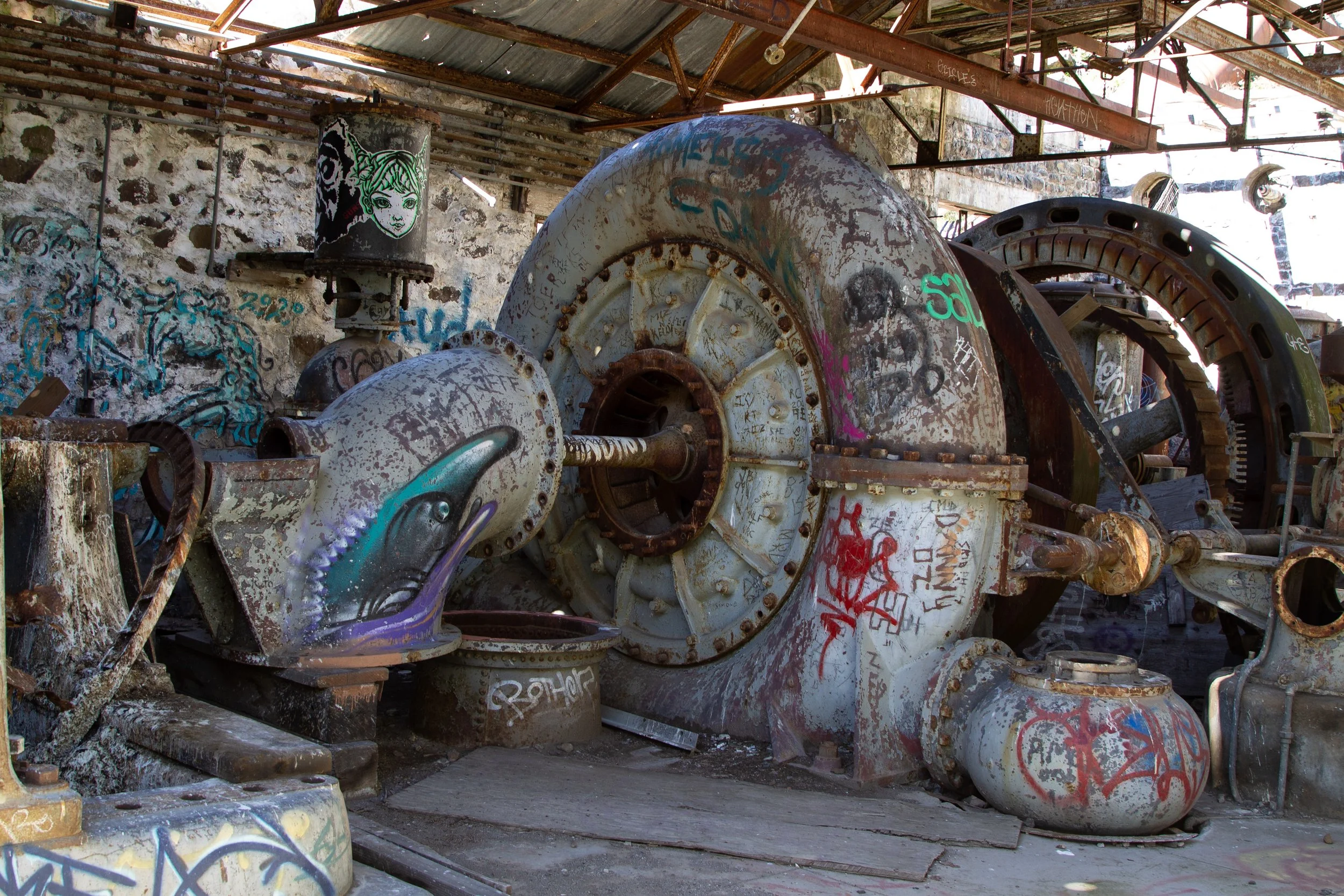 Old hydroelectric equipment with graffiti