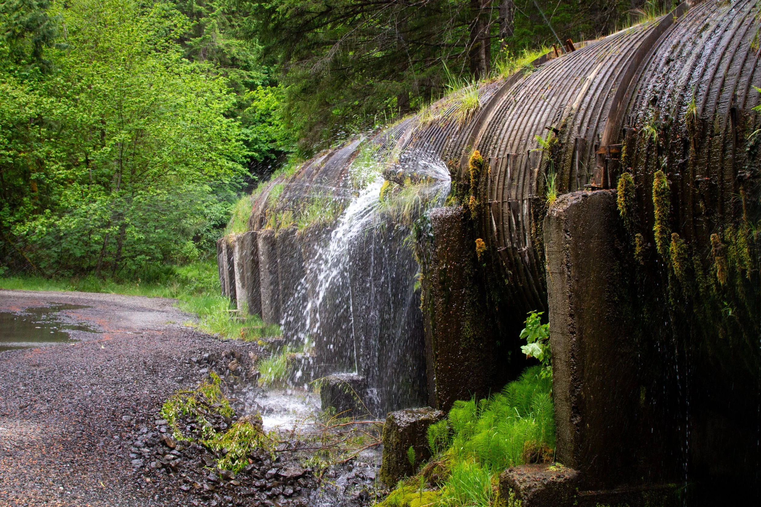Water sprays from large pipe