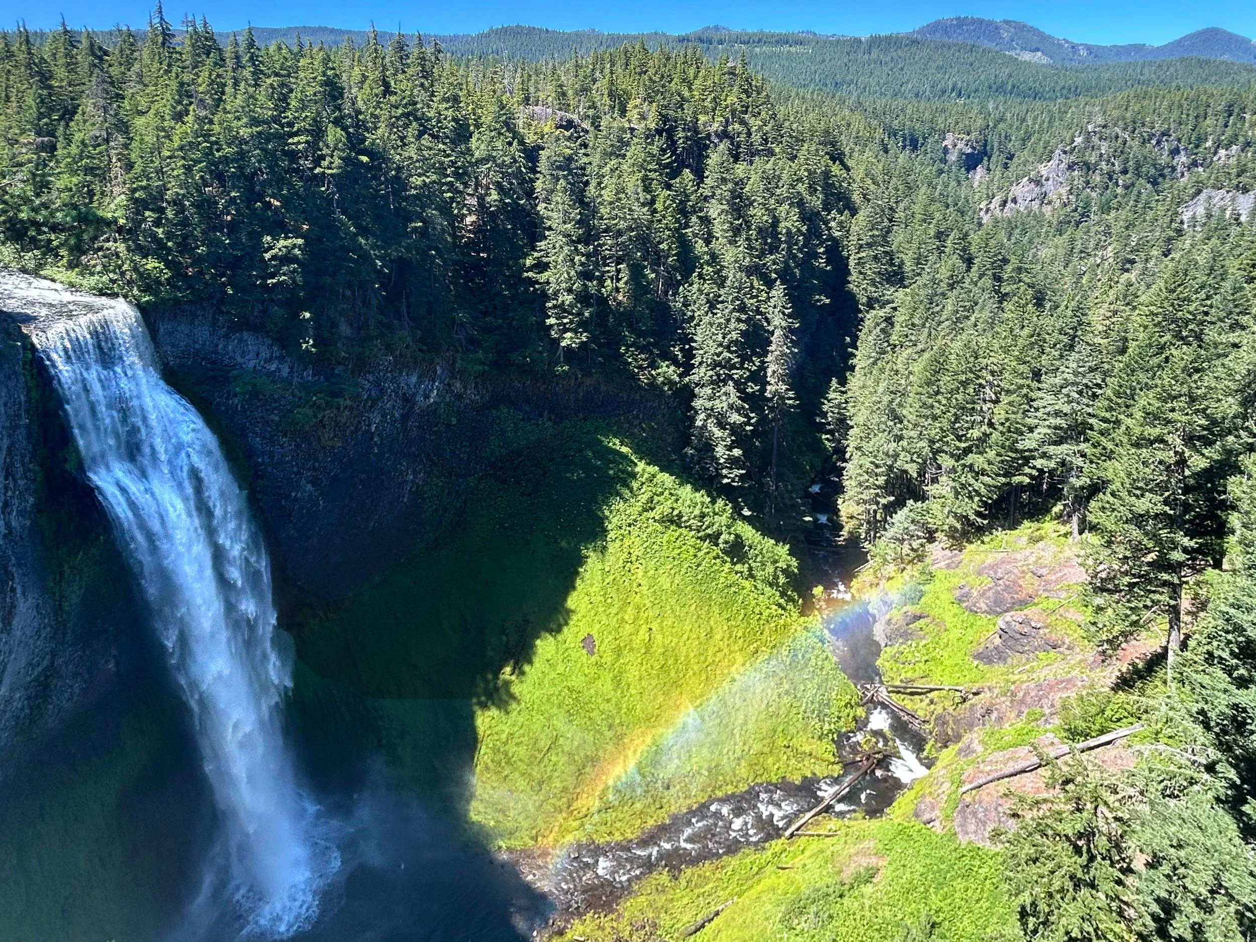 Salt Creek Falls with rainbow over creek