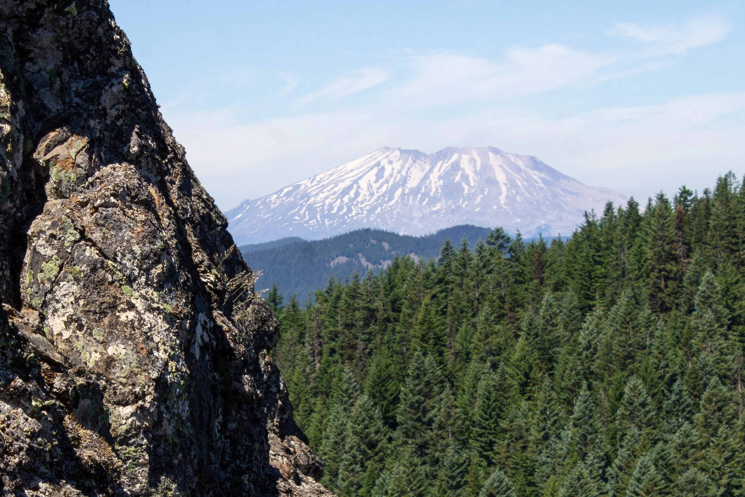 Mount St Helens behind cliff