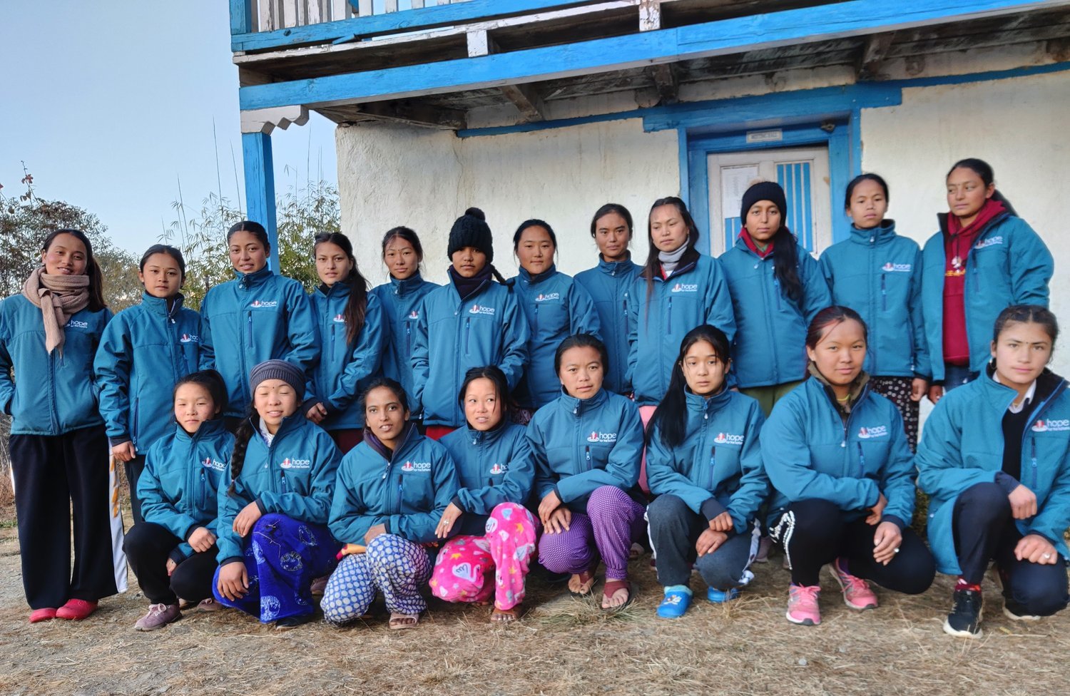 20+new+girls+with+winter+new+jackets+with+hope+for+The+Nation+logo.jpg