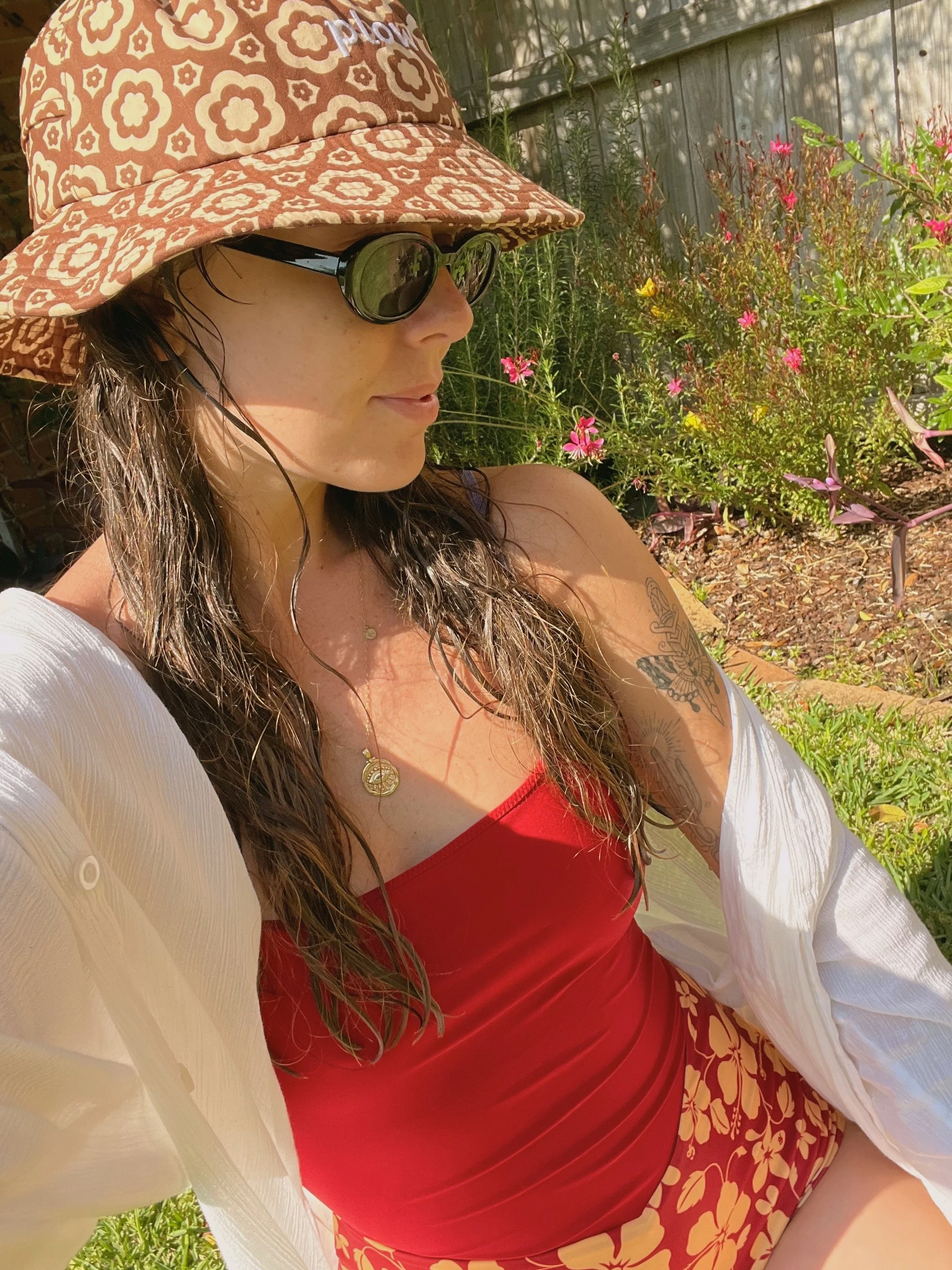 Bloomin Groover surf hat on woman in Inner Relm swimsuit