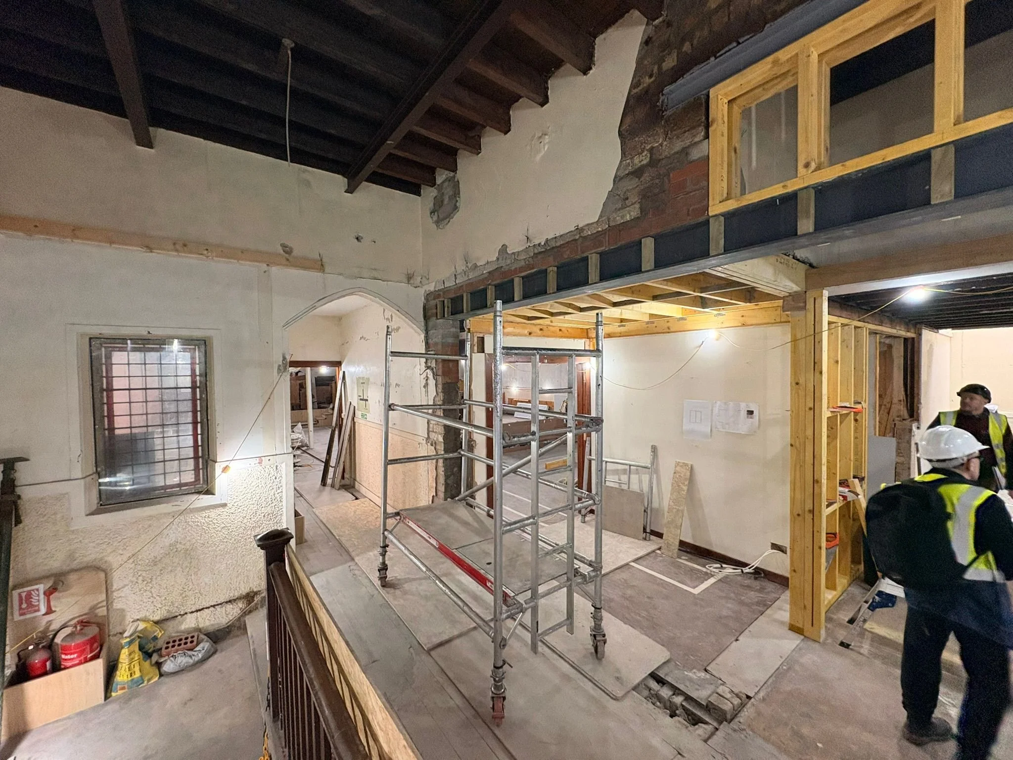 Work is underway in the kids' check-in area, designed with safety and ease in mind.