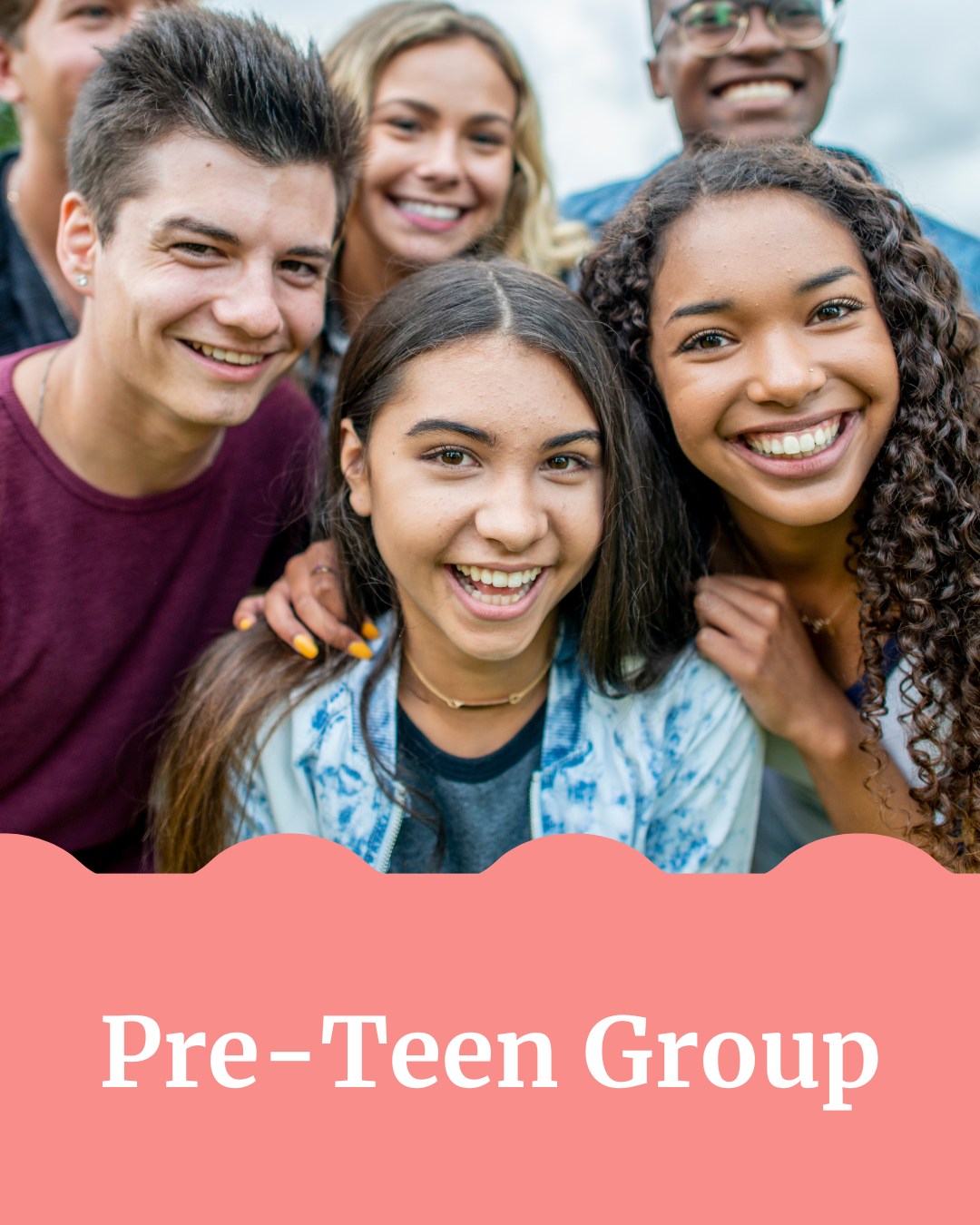 A group of smiling pre-teen friends taking a close-up selfie outdoors.