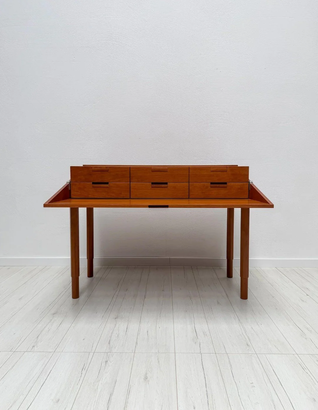 Secretary Desk by Antonio Citterio for B&amp;B Italia, c. 1985

Cherry wood, clean architectural lines and a fold-down writing surface that reveals six drawers and storage compartments &ndash; desk, secretary and console in one. Excellent vintage con