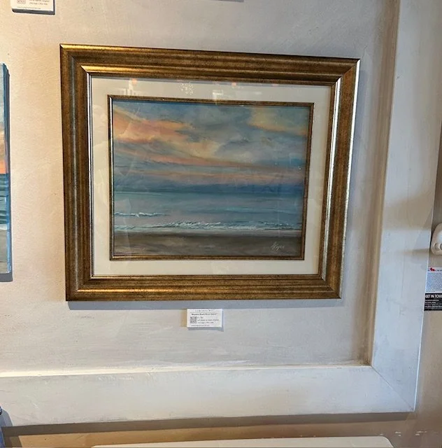 "Boynton Beach  Pastel Sunset" with frame, hanging on wall.jpg