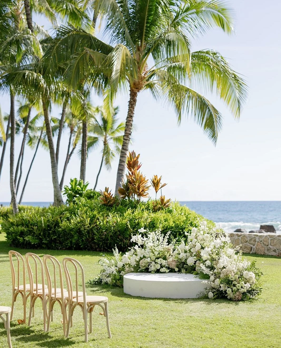 Sleek, chic, and picture-perfect &mdash; our white platform gave this love story the stage it deserved 🤍⁠
Featuring Our White Ceremony Platform, Natural Bistro Chairs ⁠
.⁠
.⁠
Vendors✨⁠
venue: @lanikuhonua⁠
photo: @sarajualphoto⁠
video: @sophiaroud⁠
