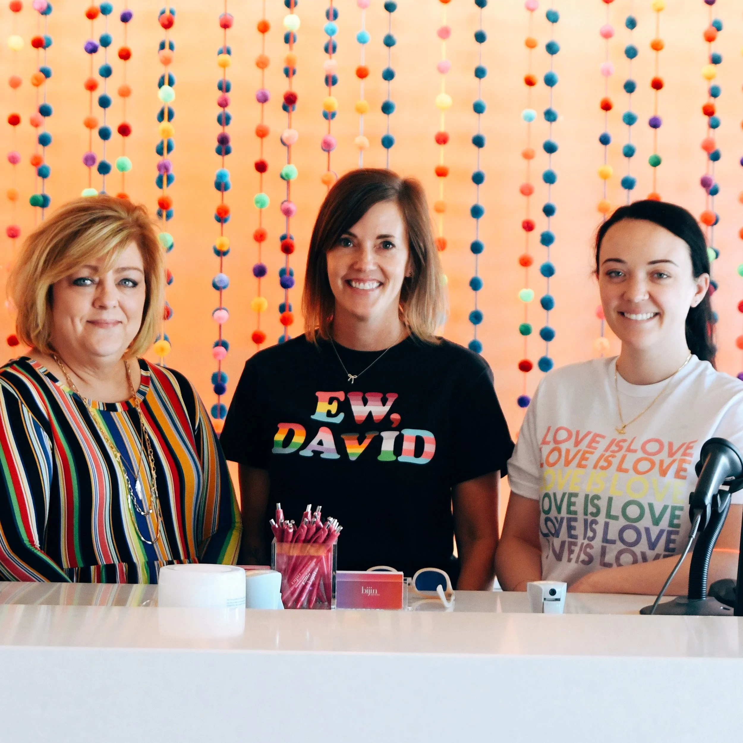 The professional and helpful client services team providing guest support at bijin salon in The Prairie Village Shops.