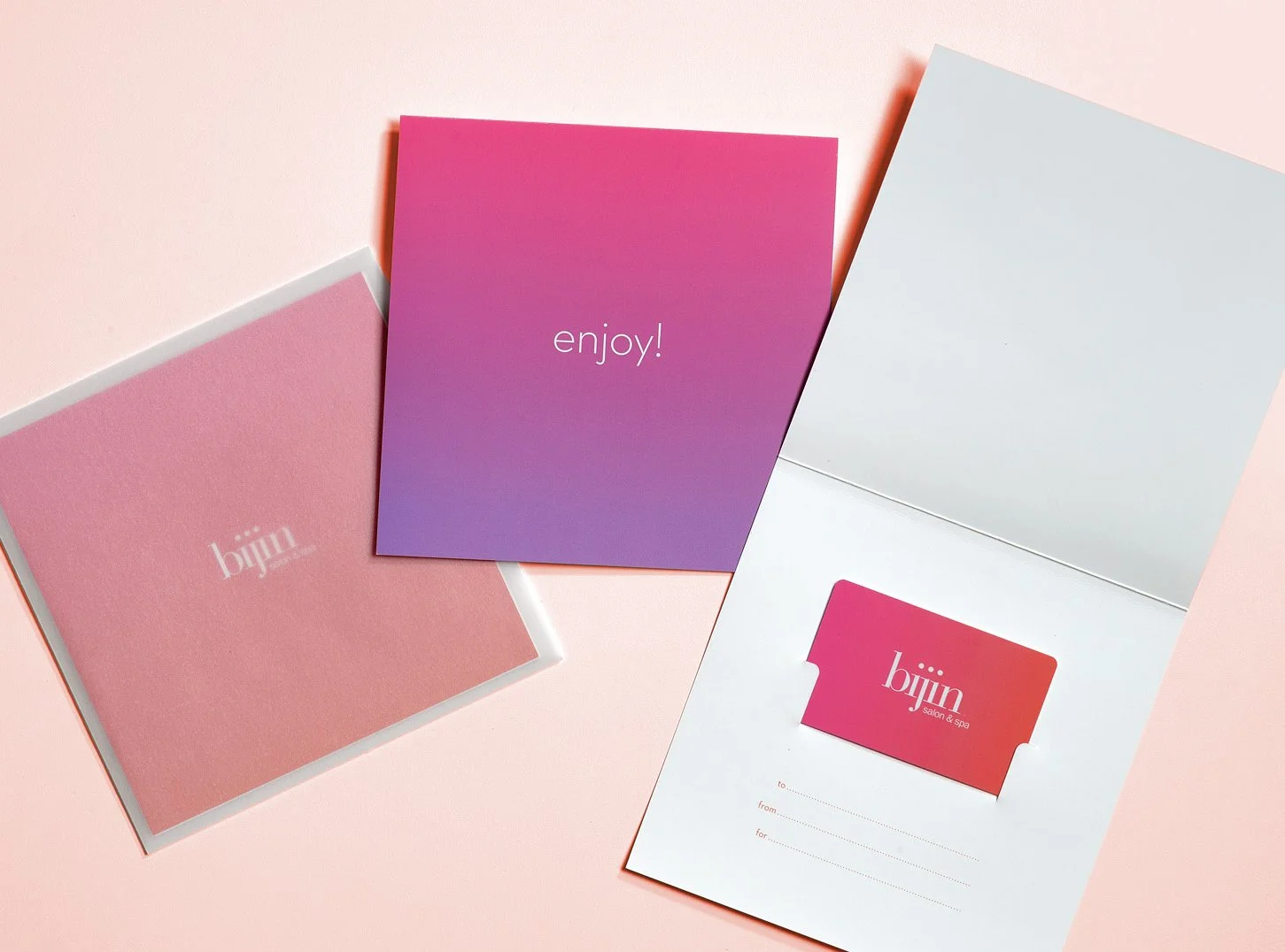 Purchase a bijin gift card in-store and receive a colorful and simply designed folder, available at bijin salon & spa located in The Shops of Prairie Village.