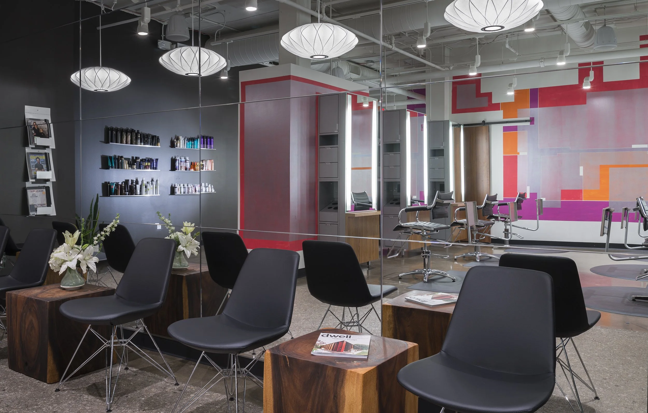 The vibrant studio lounge and styling floor at bijin salon & spa in Prairie Village.