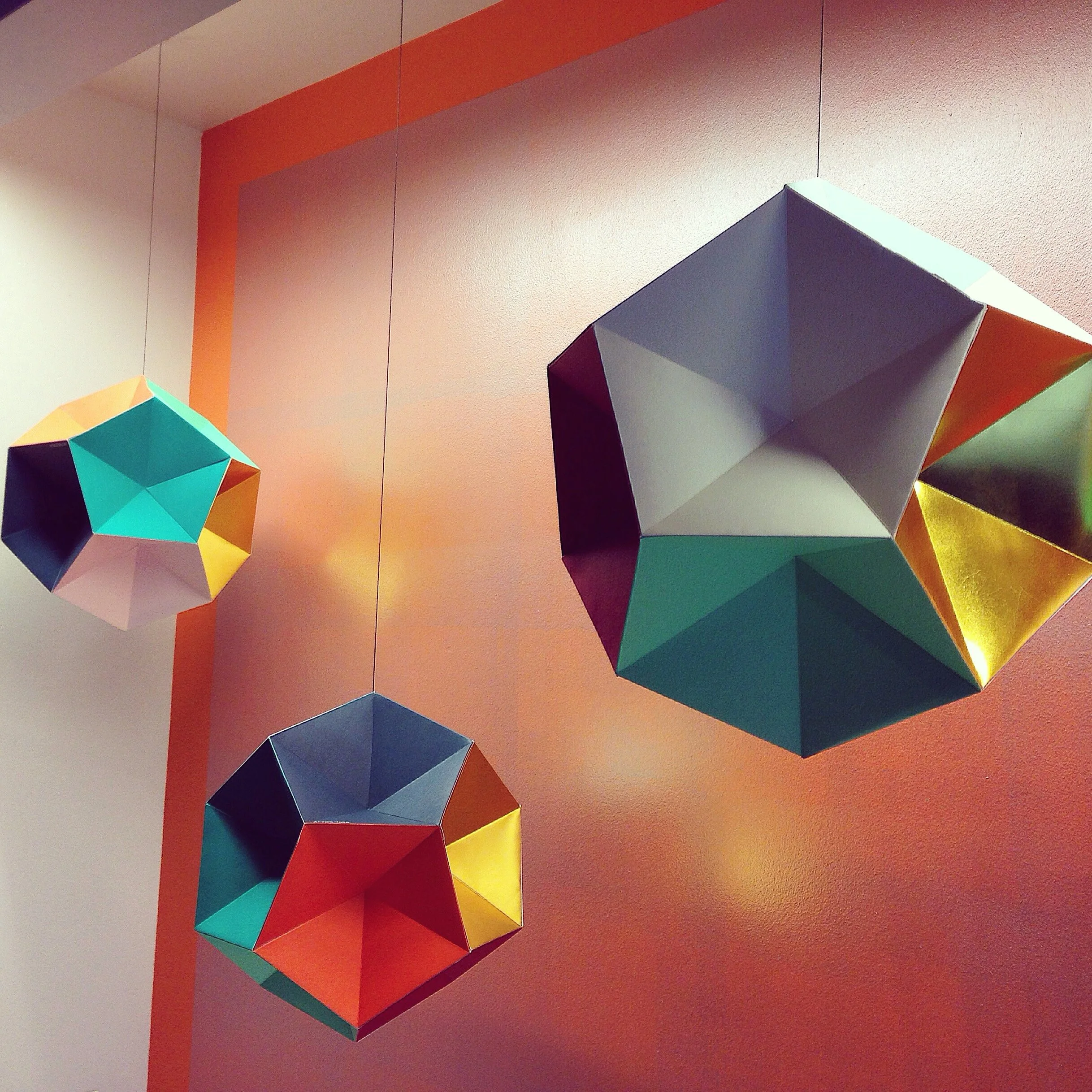 Colorful, graphic decor at checkout at bijin salon & spa in The Shops of Prairie Village.