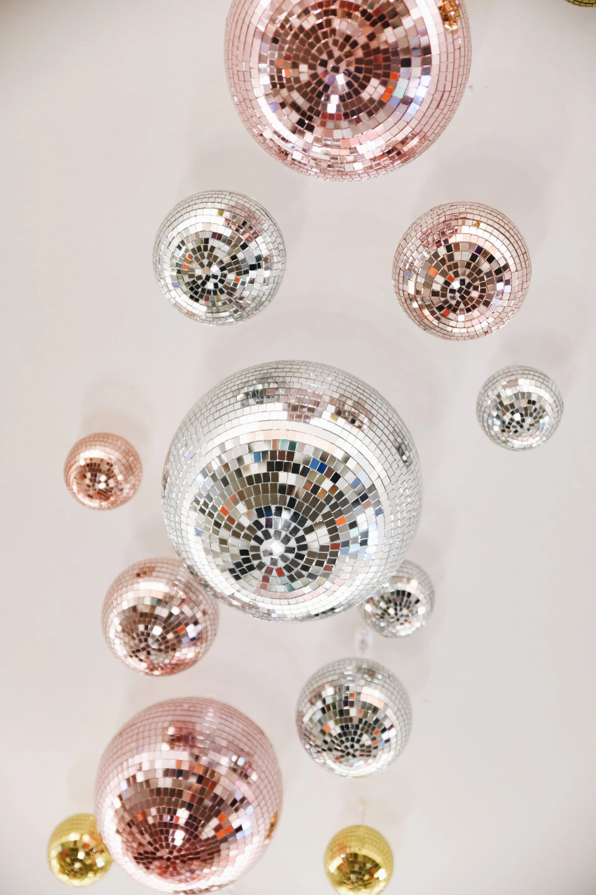 Disco balls are sparkly, fun seasonal decor at bijin salon & spa in Prairie Village, Kansas City metro.