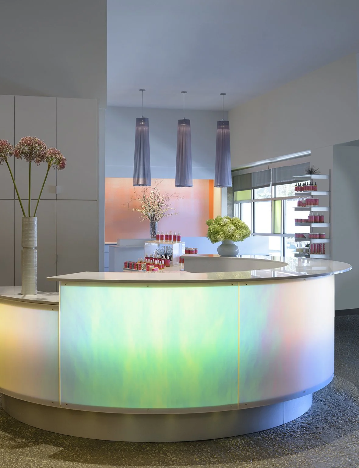 Our illuminated ombré check-in desk and concierge station where guests are greeted with a smile by our bijin guest services team.