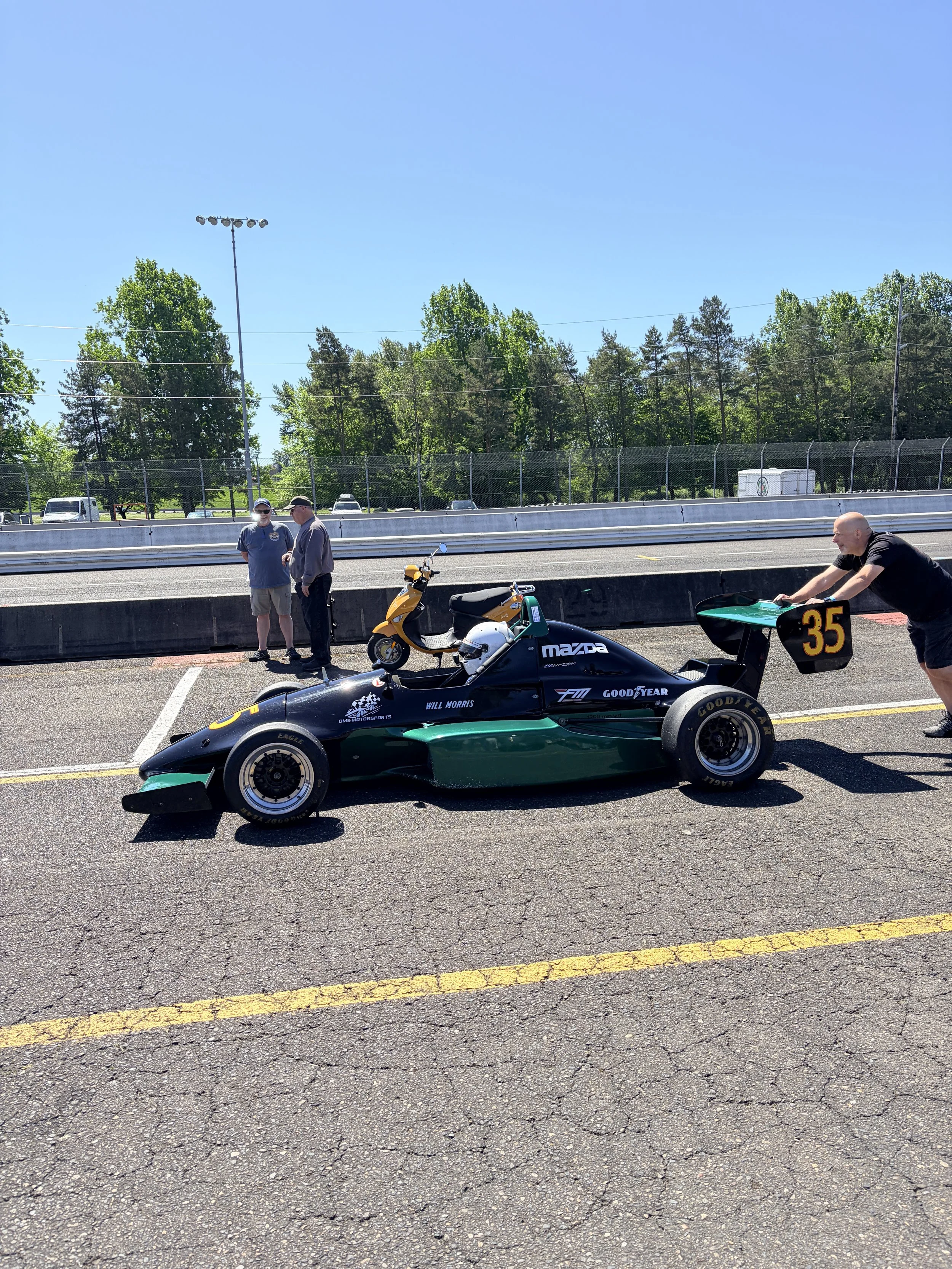 Getting pushed to the scales by the head of our pit crew