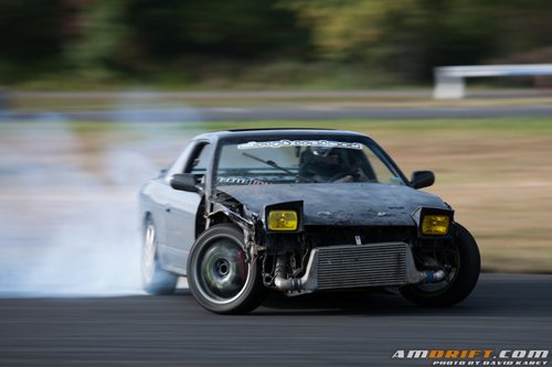 Close-up of a Race Car Drifting at a Race Track · Free Stock Photo