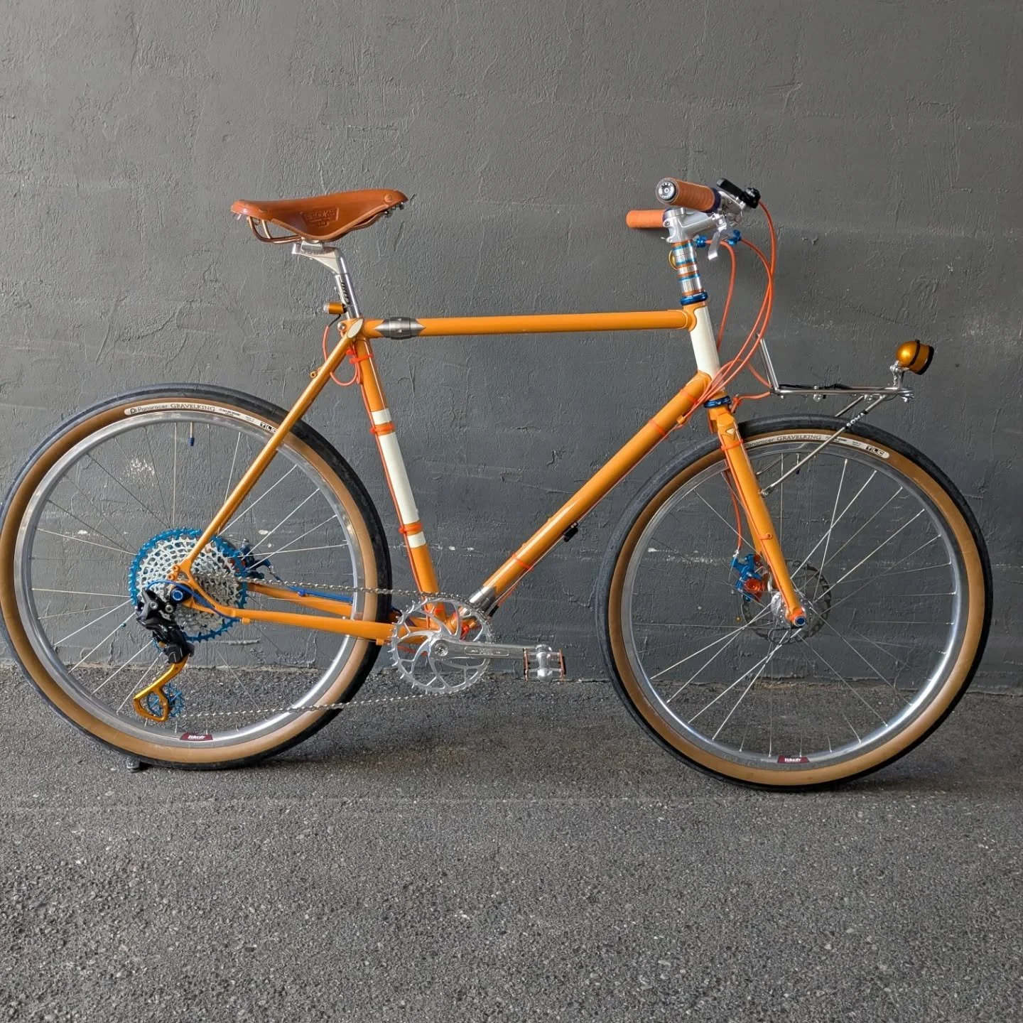 John finally came in to show us the project he's been working on, and isn't it a beauty! 
He built the frame himself while attending Bohemian Frame building School and had Franklin Frames do the paint work. 
From there he slapped all the prettiest pa