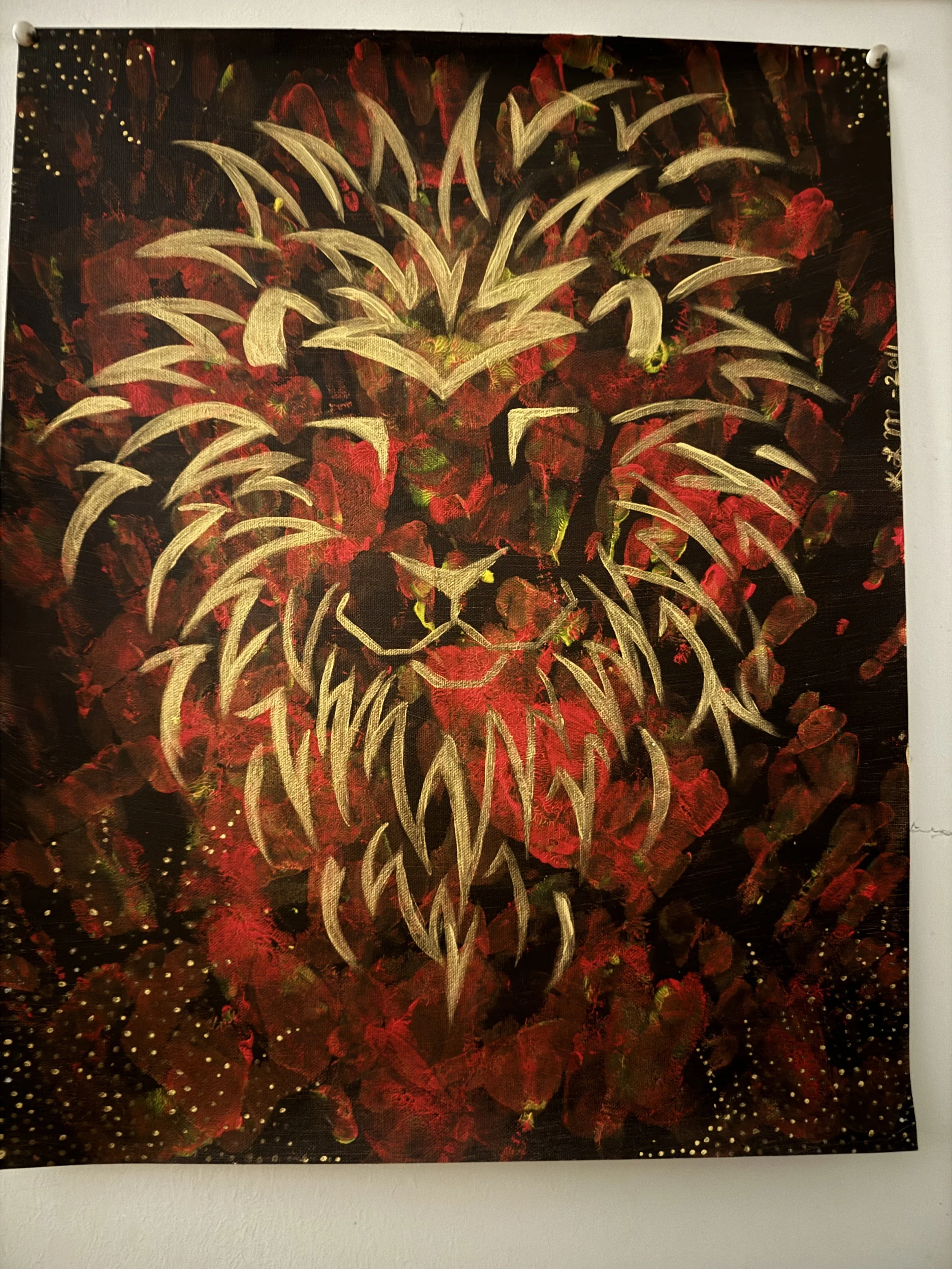 "Lion through Fire"
Medium: acrylic paint on canvas. 
The "fire" is made by handprints beneath the lion