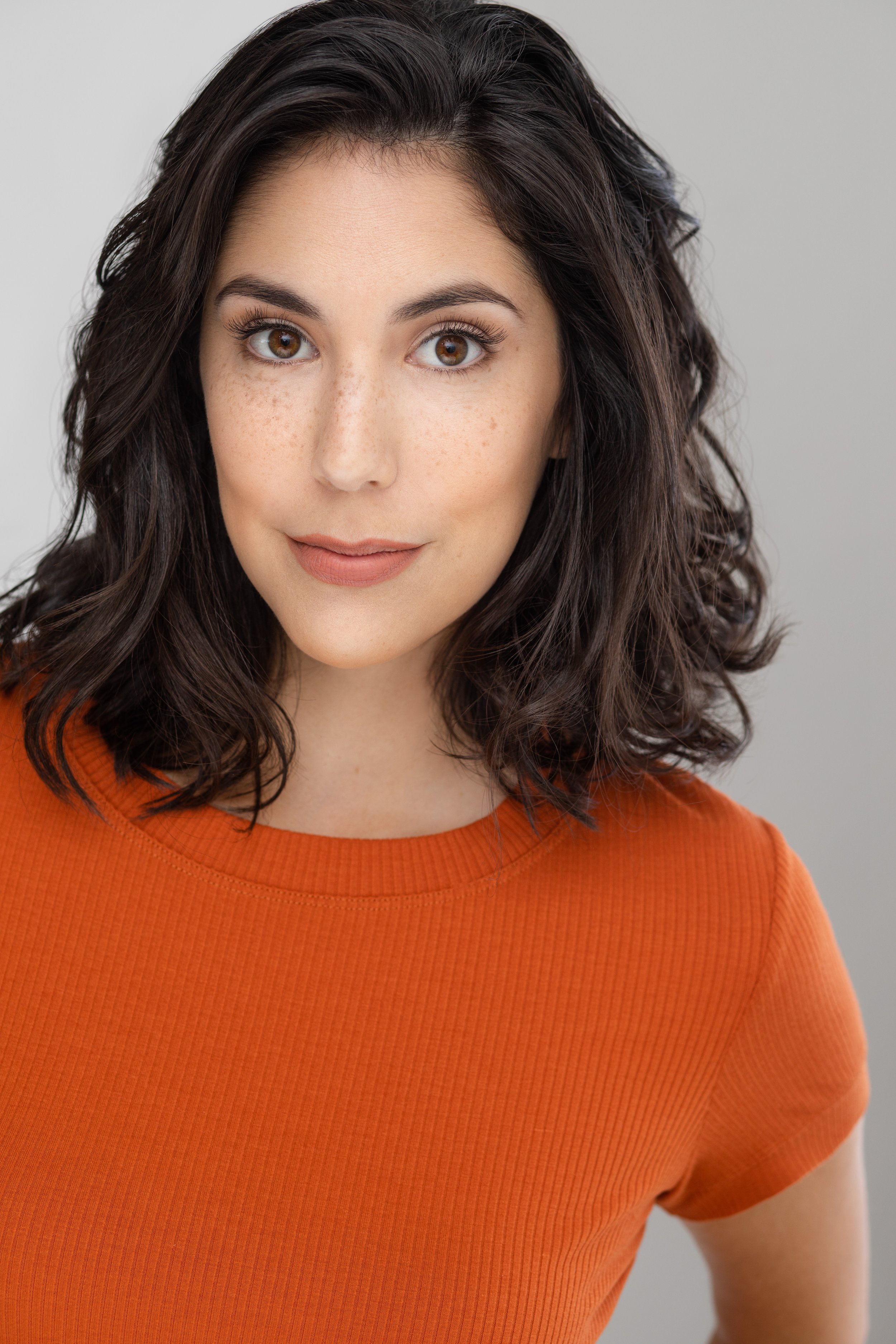 Headshot Hair and Makeup. Soft makeup with light styling.