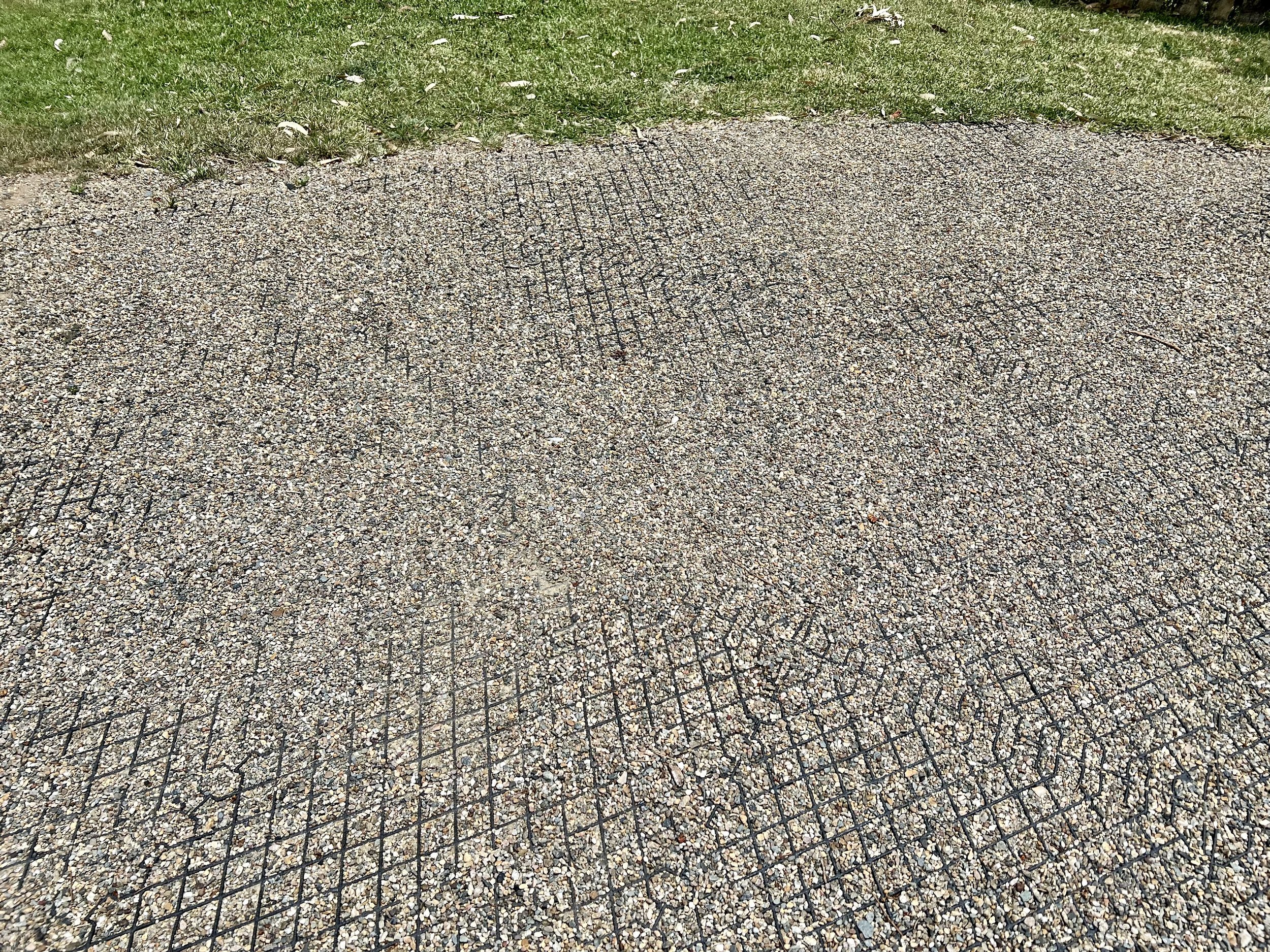 Gravel driveway reinforced for mobility stability