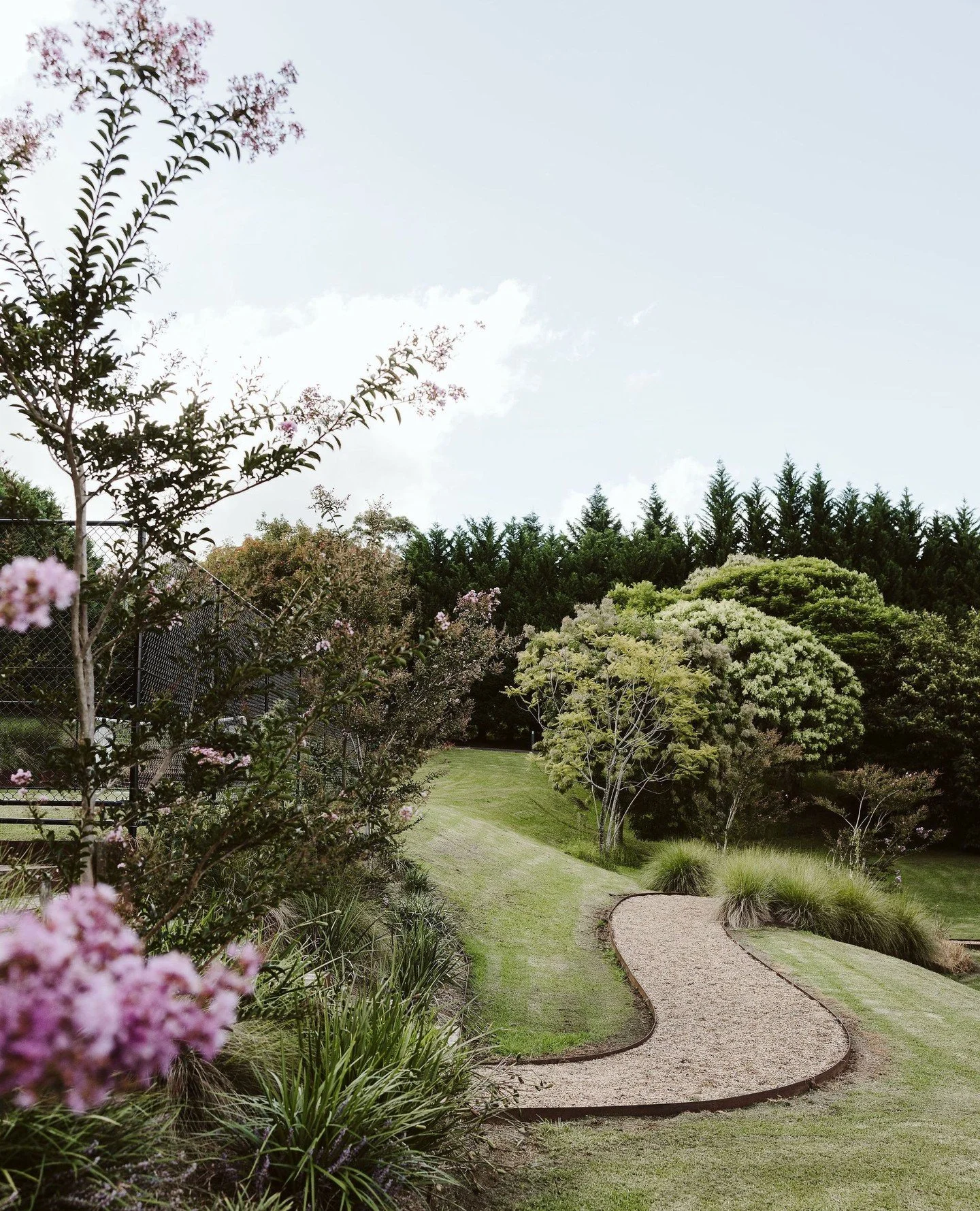 Thoughtful landscape design respects existing slopes and natural contours, a practical and cost-conscious approach, particularly across large residential sites and acreage properties. ⁠
⁠
Letting the topography inform the layout creates a garden that