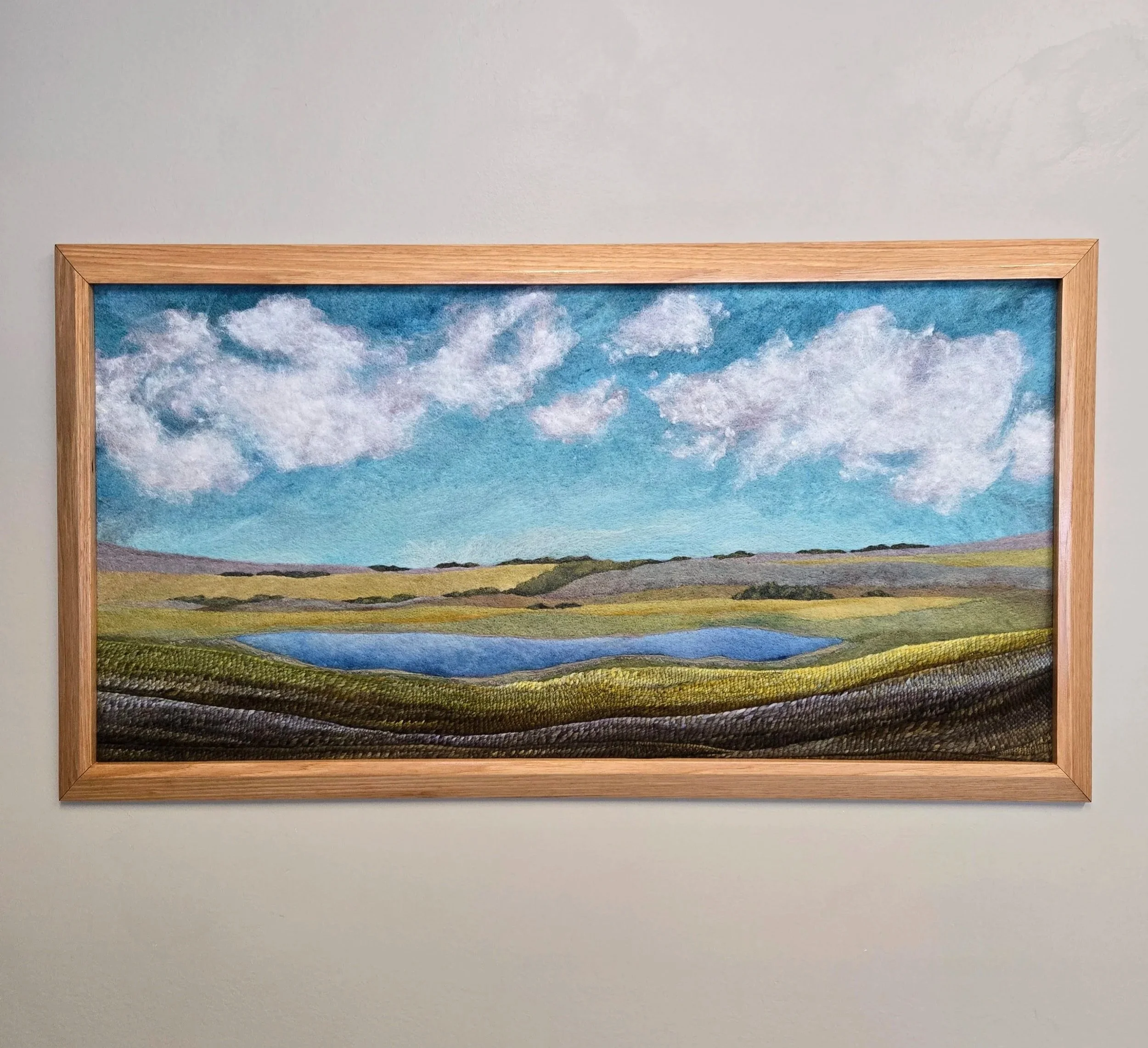 North on 16
Needle felted and braided wool, custom hemlock frame 
W37" x H20"
$7,200