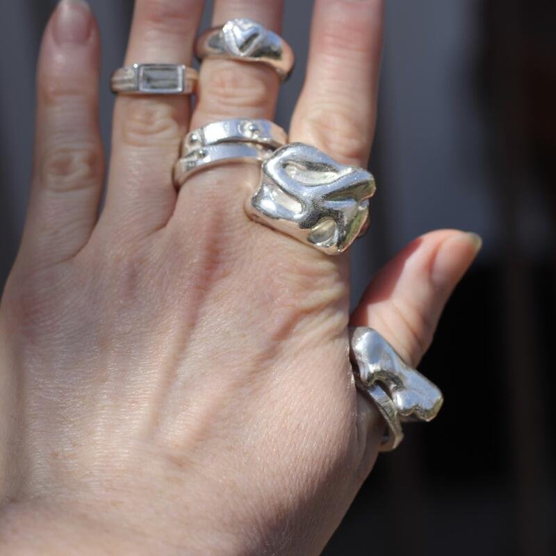 six sterling silver lost wax cast rings.jpg