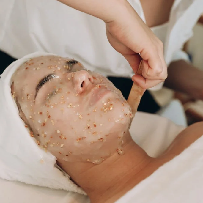 A woman getting a clean pore cleansing facial in Vancouver, British Columbia, Canada.