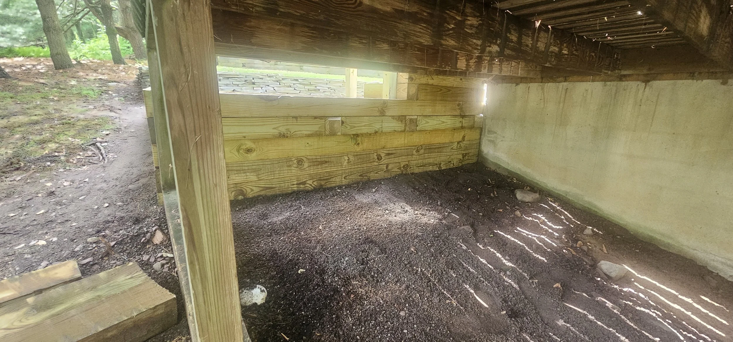 Pressure treated timber retaining wall