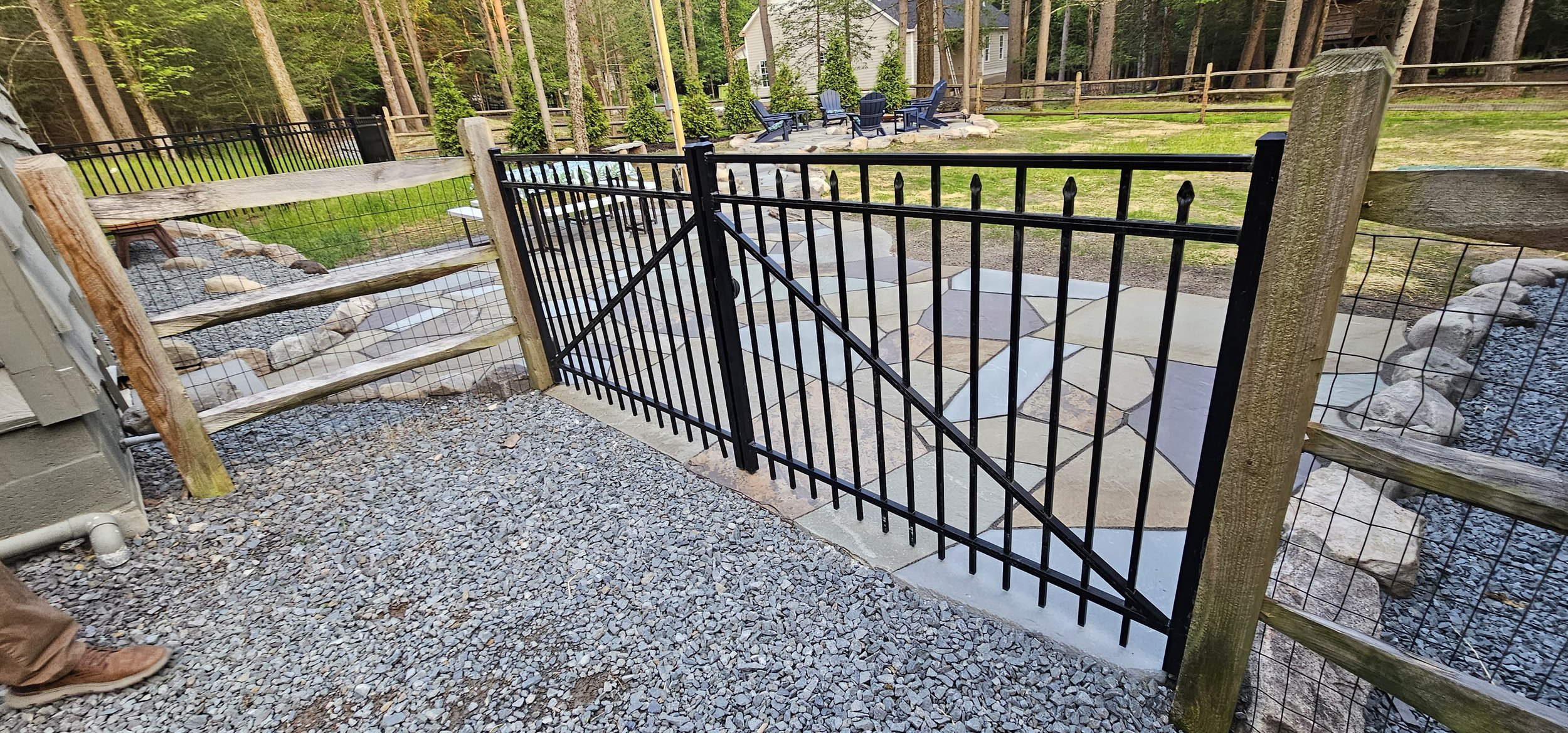 Entrance gate onto bluestone patio